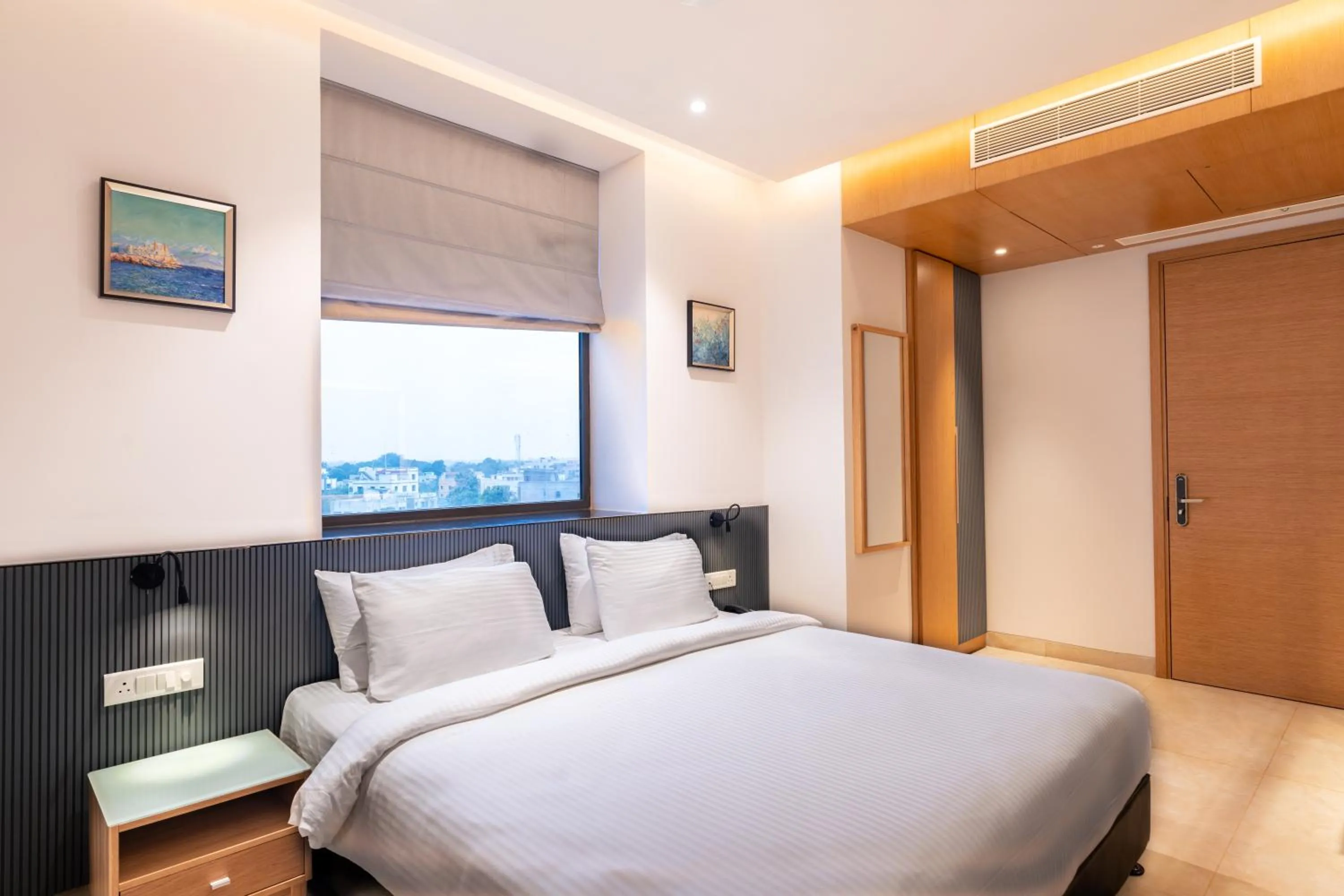 Bed in Krishna's courtyard Hotel & Convention