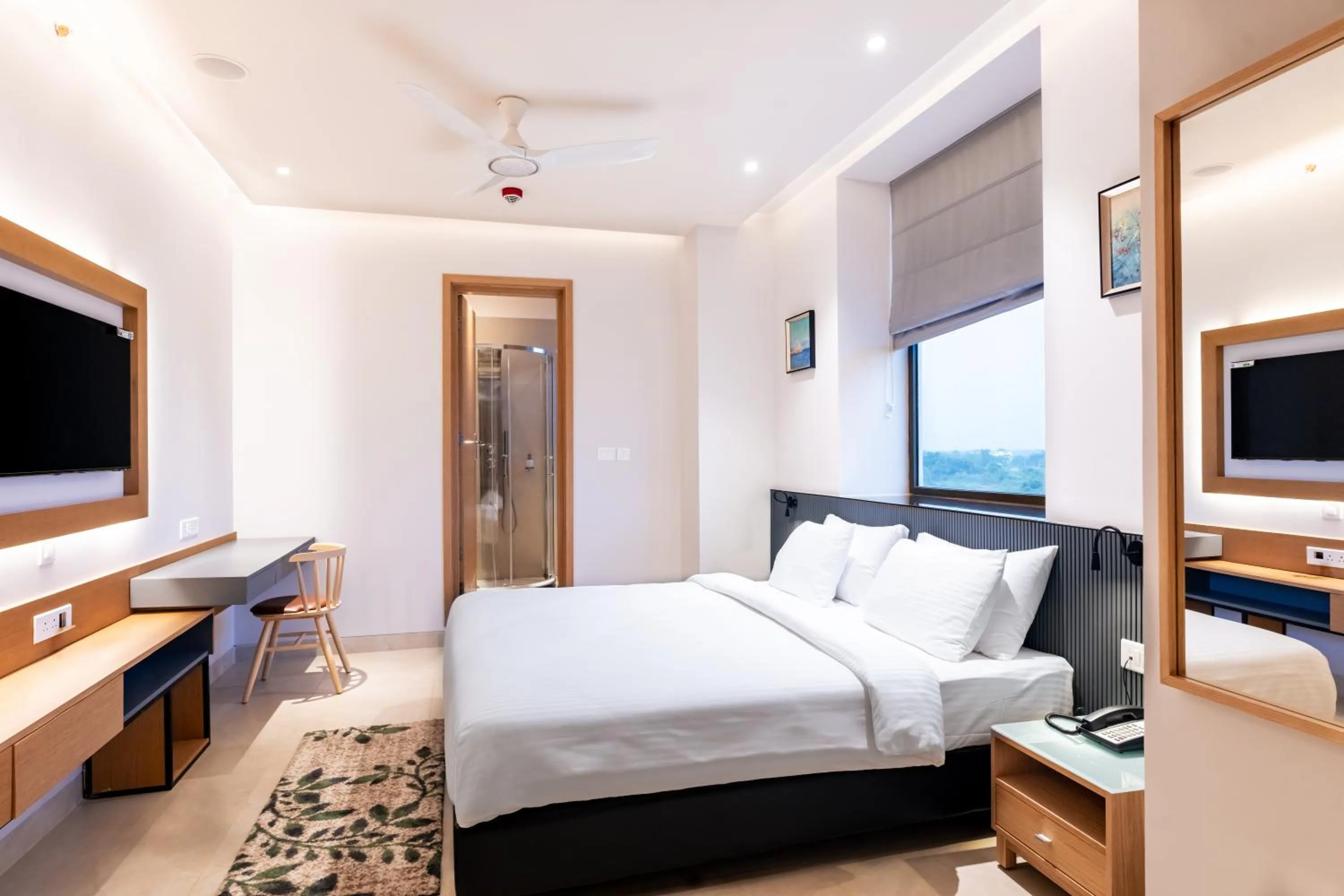 Shower, Bed in Krishna's courtyard Hotel & Convention