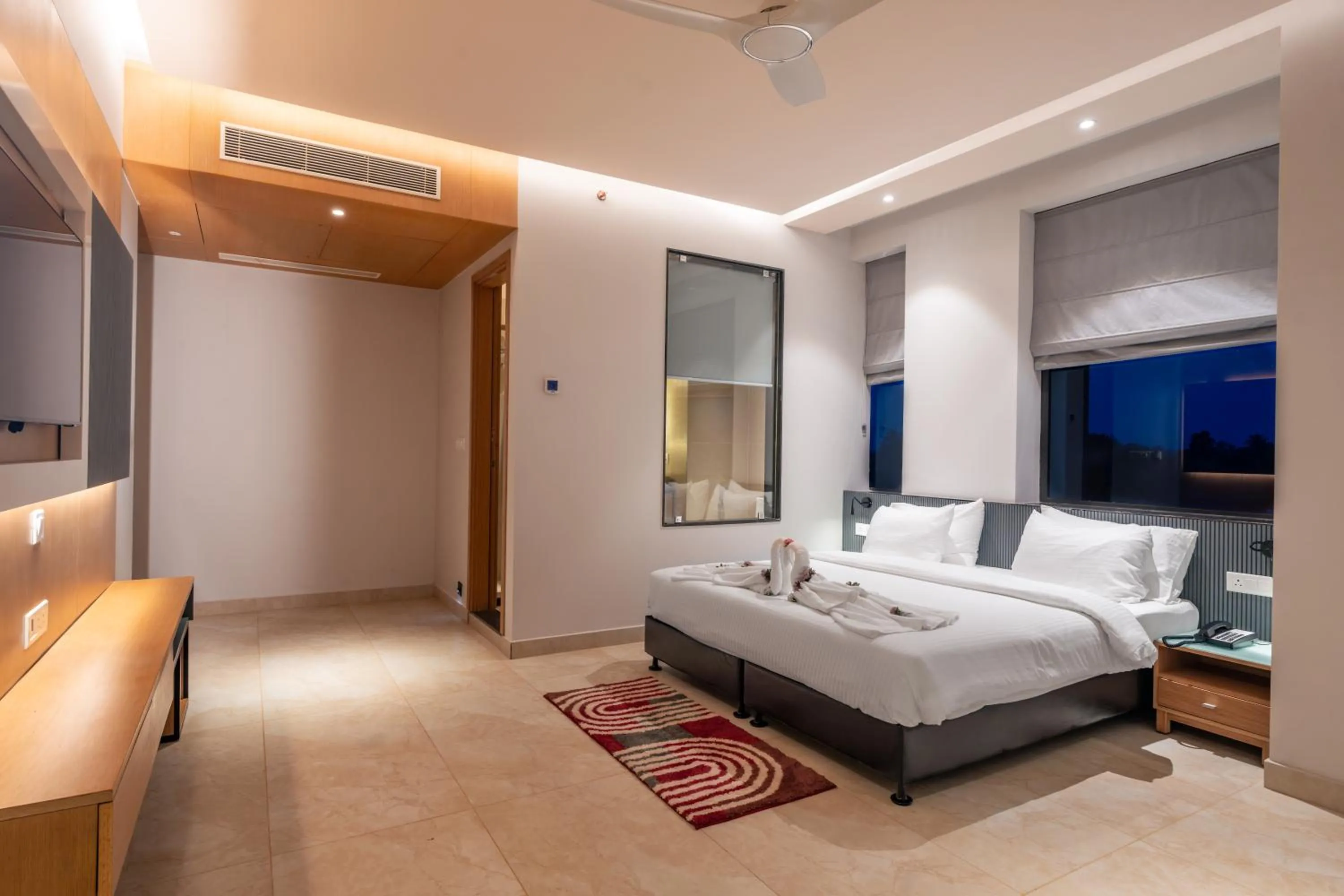 air conditioner, Bed in Krishna's courtyard Hotel & Convention