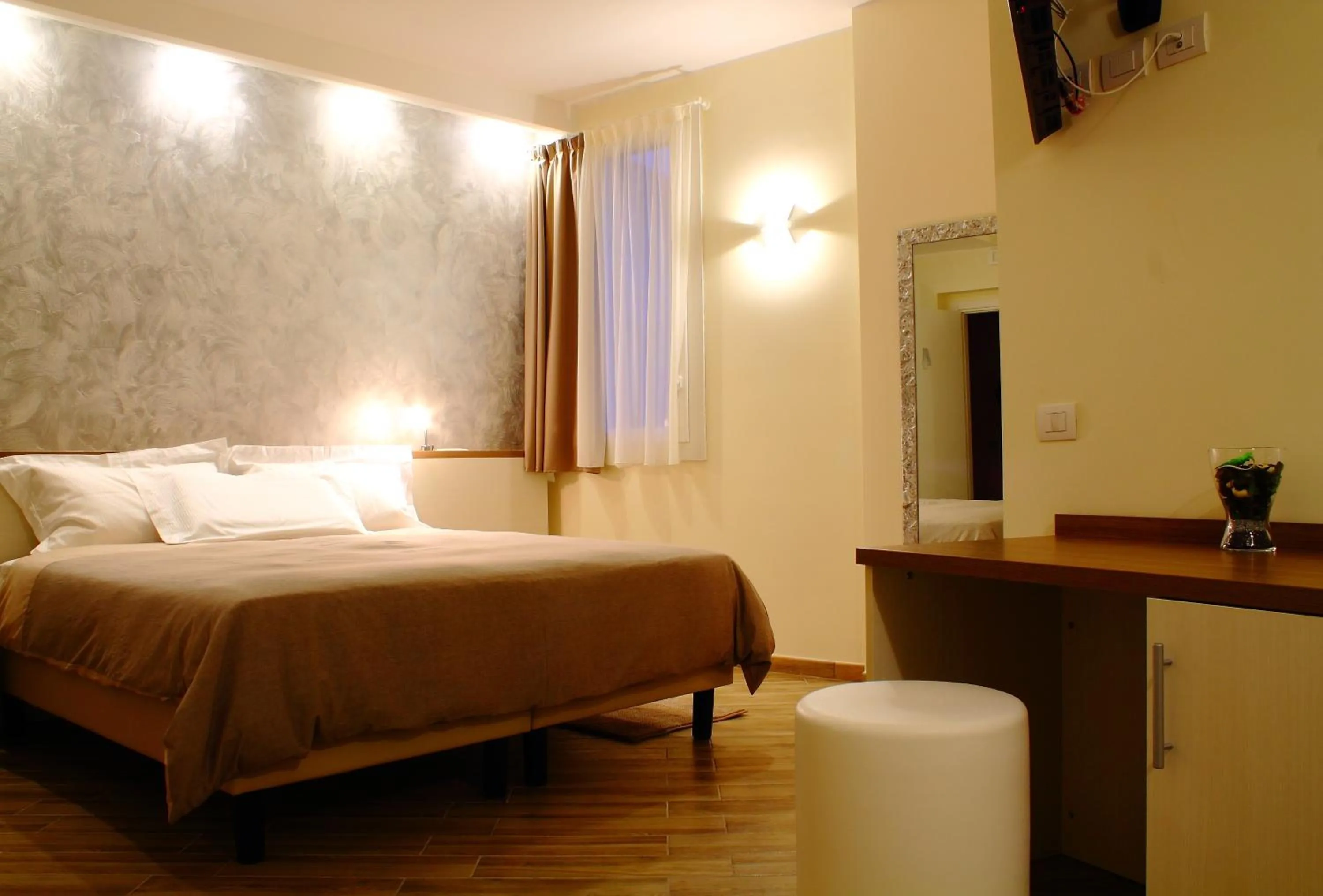 Bed in BHL Boutique Rooms Legnano