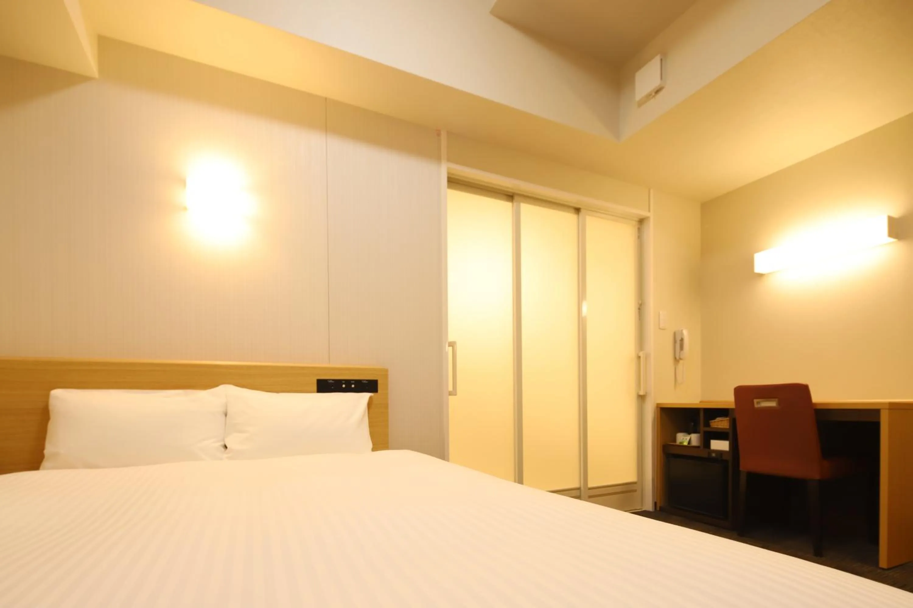 Bed in AB Hotel Anjo