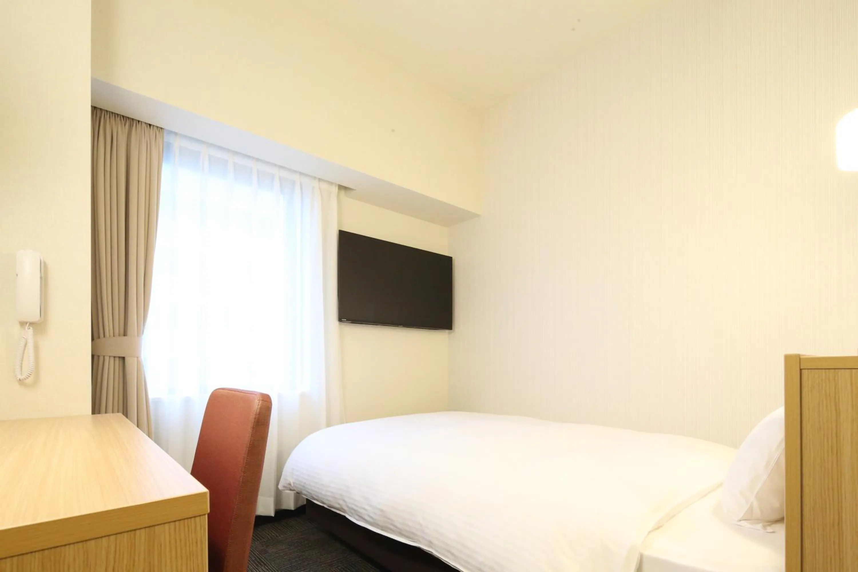 Bed in AB Hotel Anjo