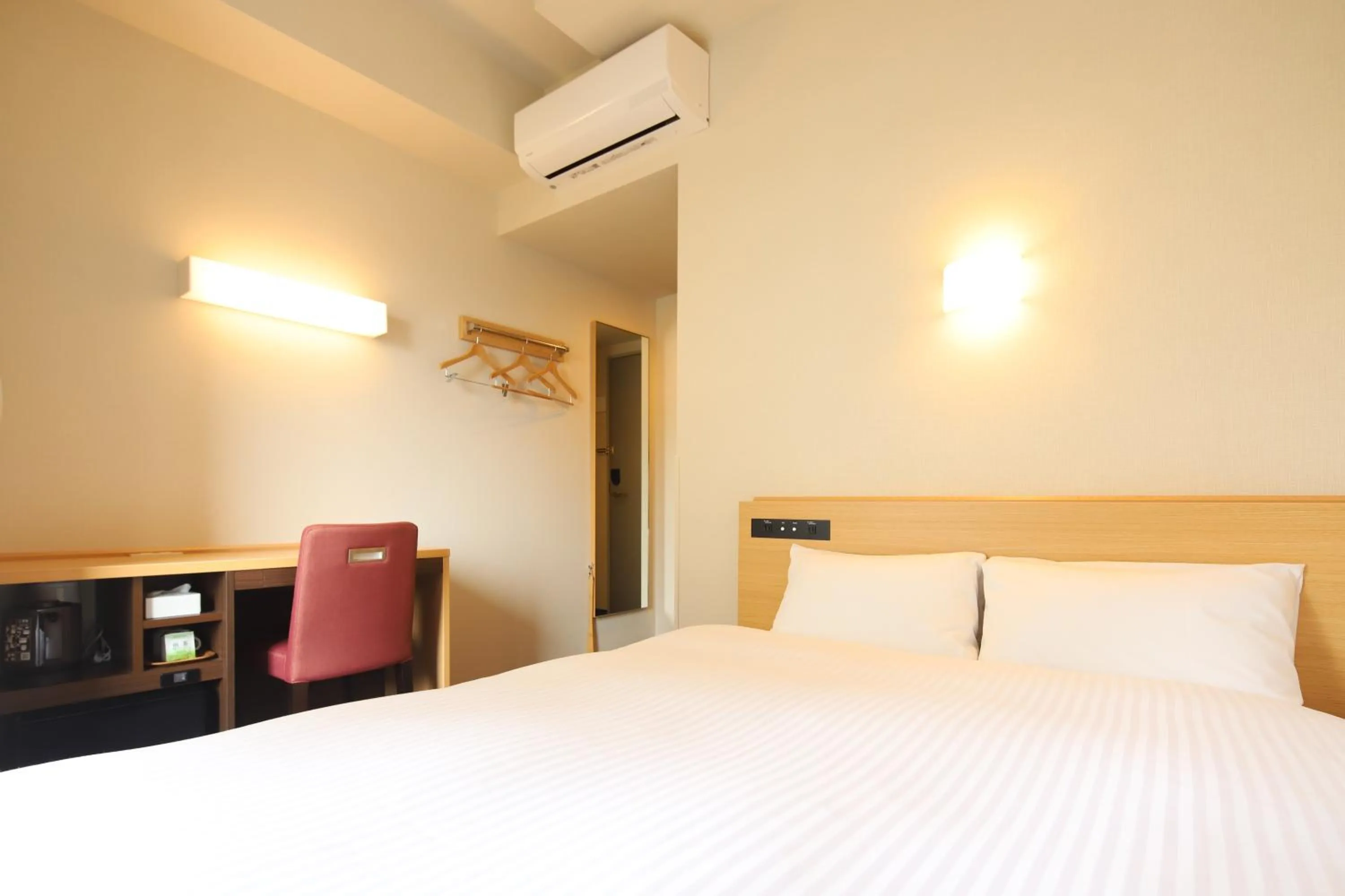 Bed in AB Hotel Anjo