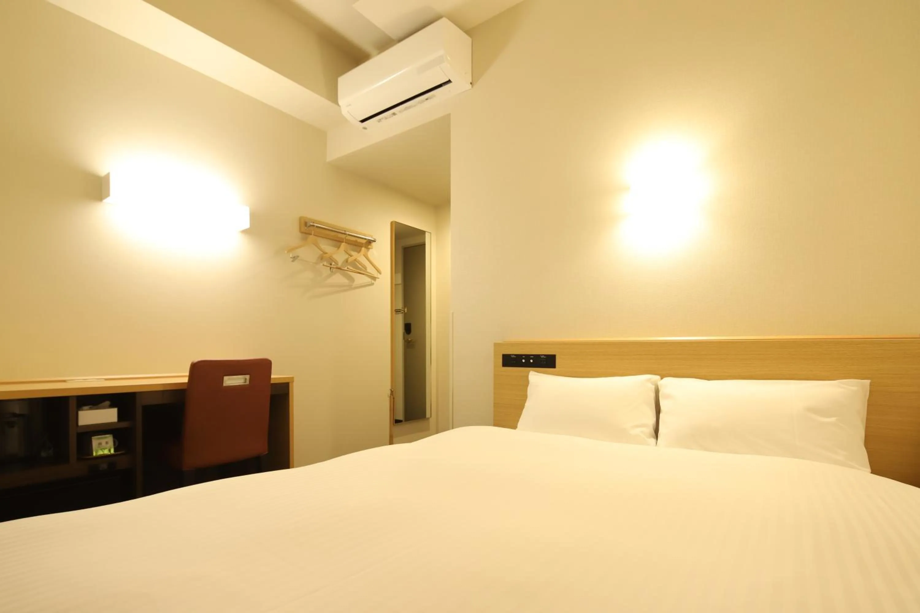 Bed in AB Hotel Anjo