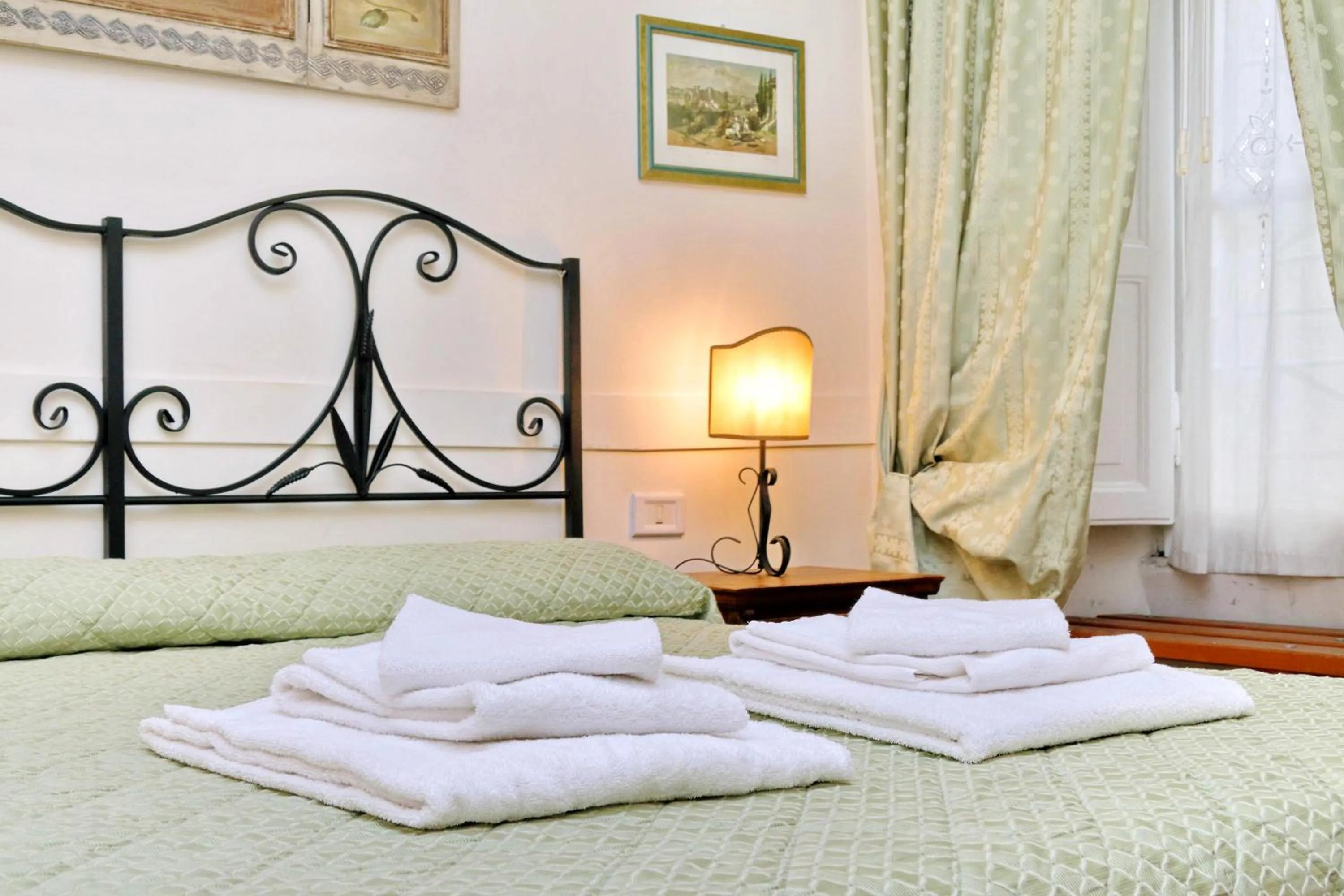 Bed in Scipioni Suites