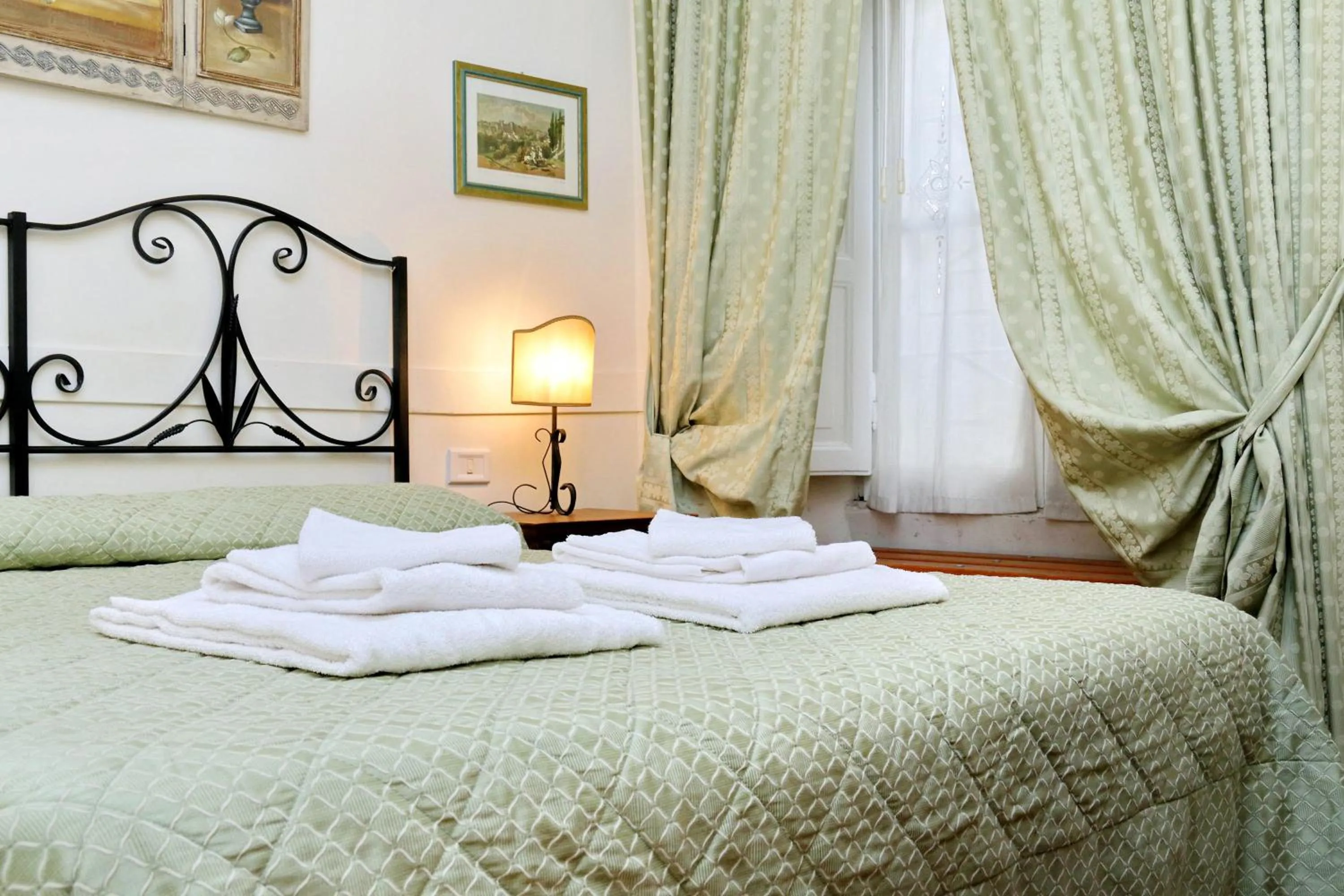 Bed in Scipioni Suites