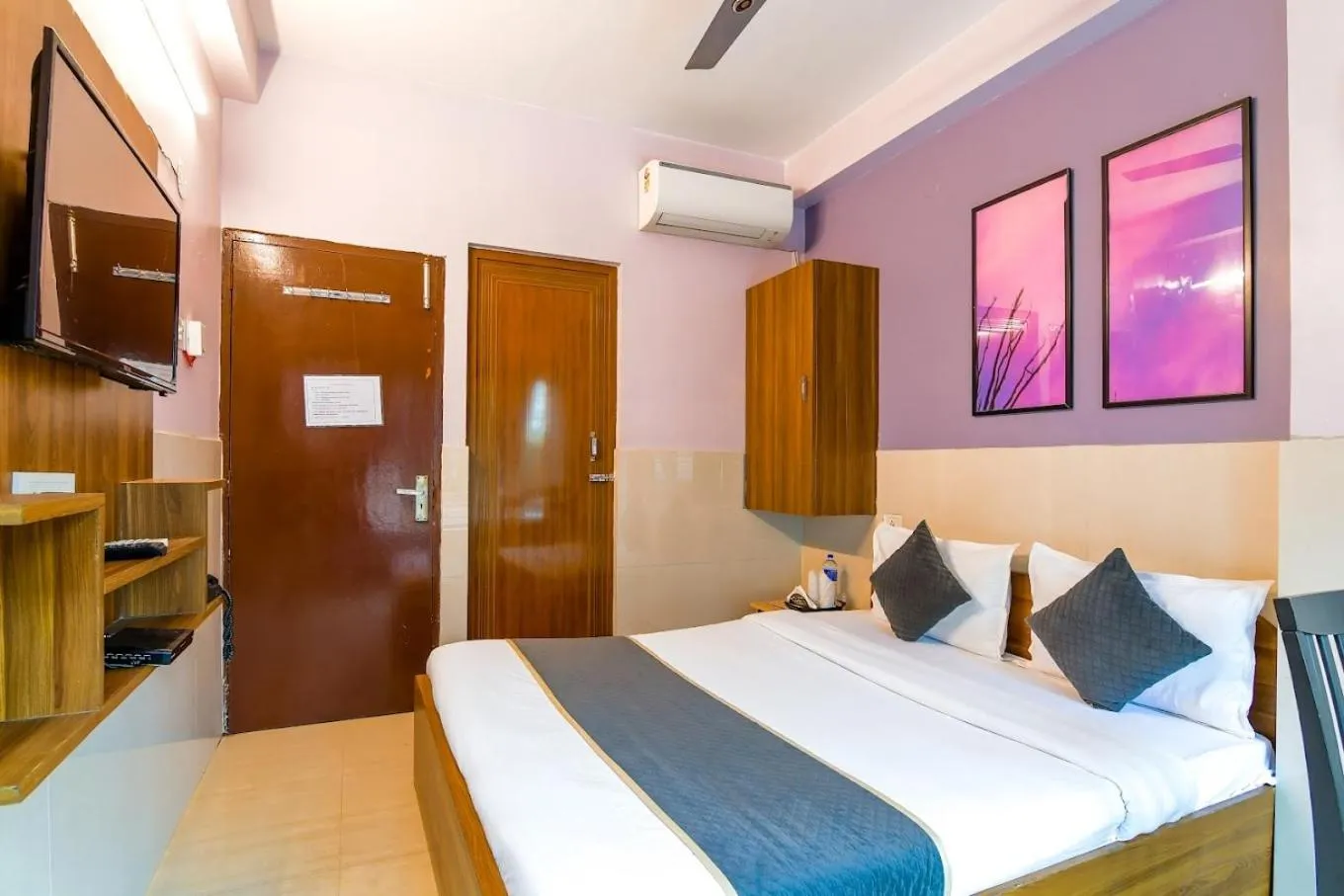 Bed in The Kolkata Hotel