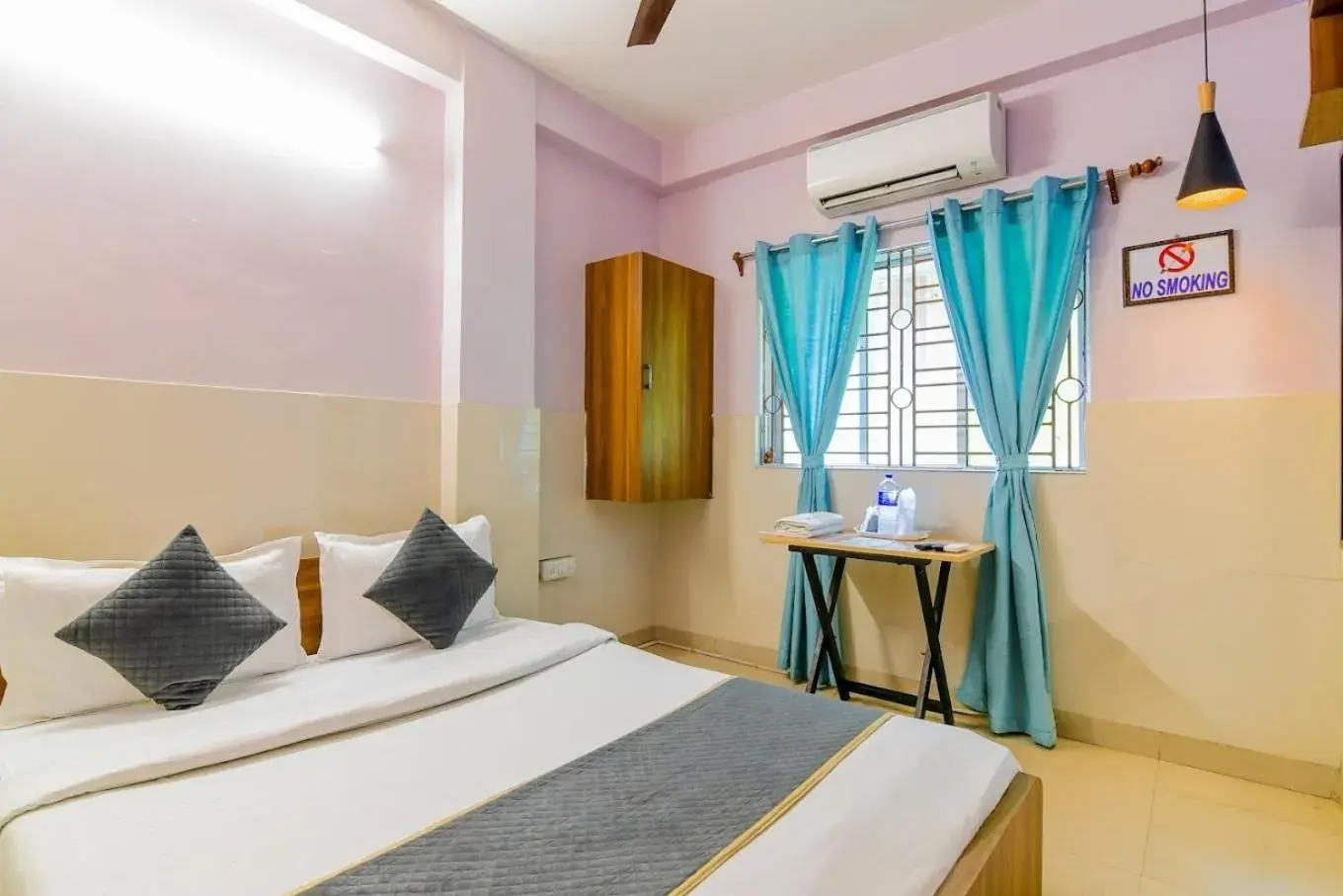 Bed in The Kolkata Hotel Bed in The Kolkata Hotel