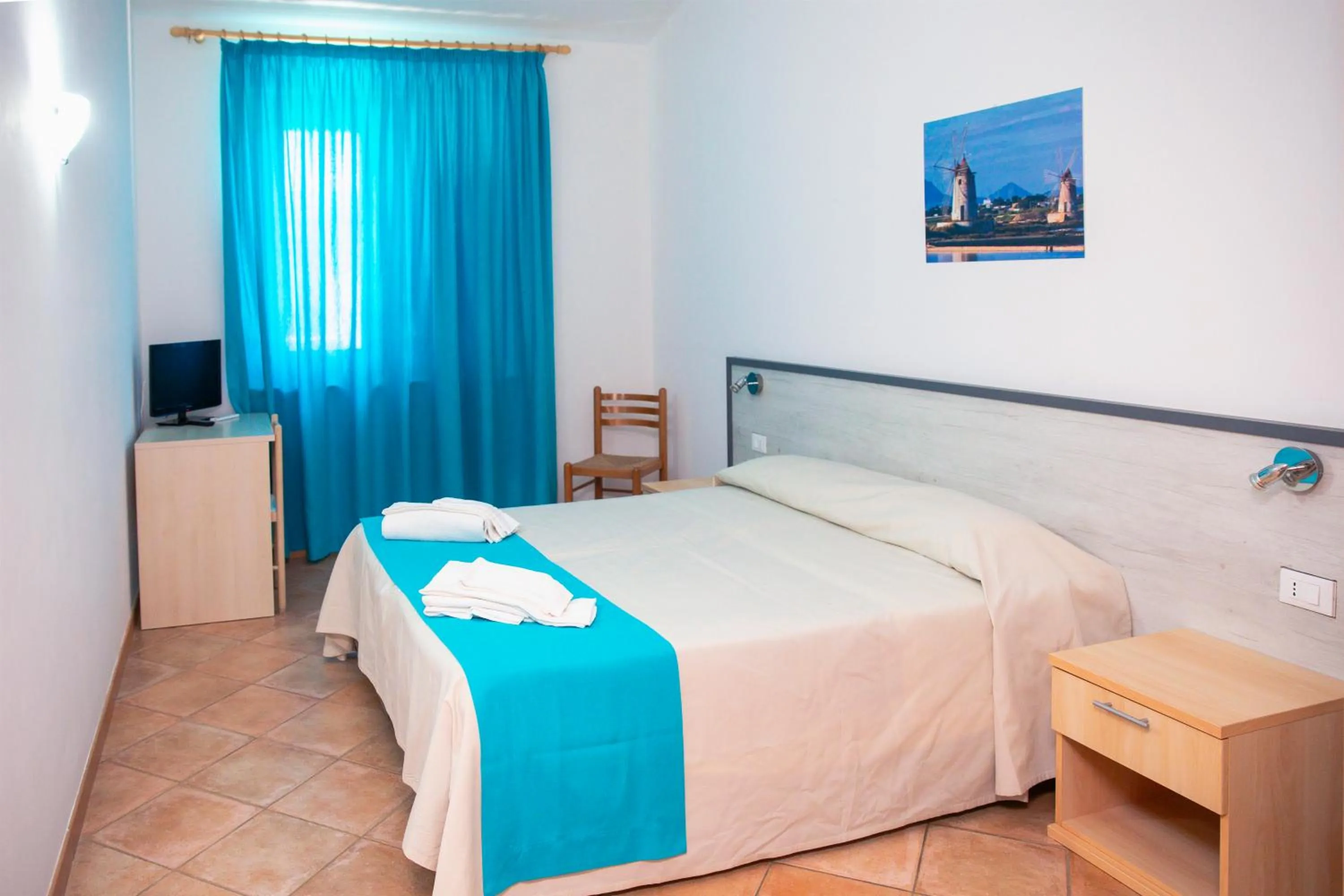 Bed in Resort Santa Maria Hotel