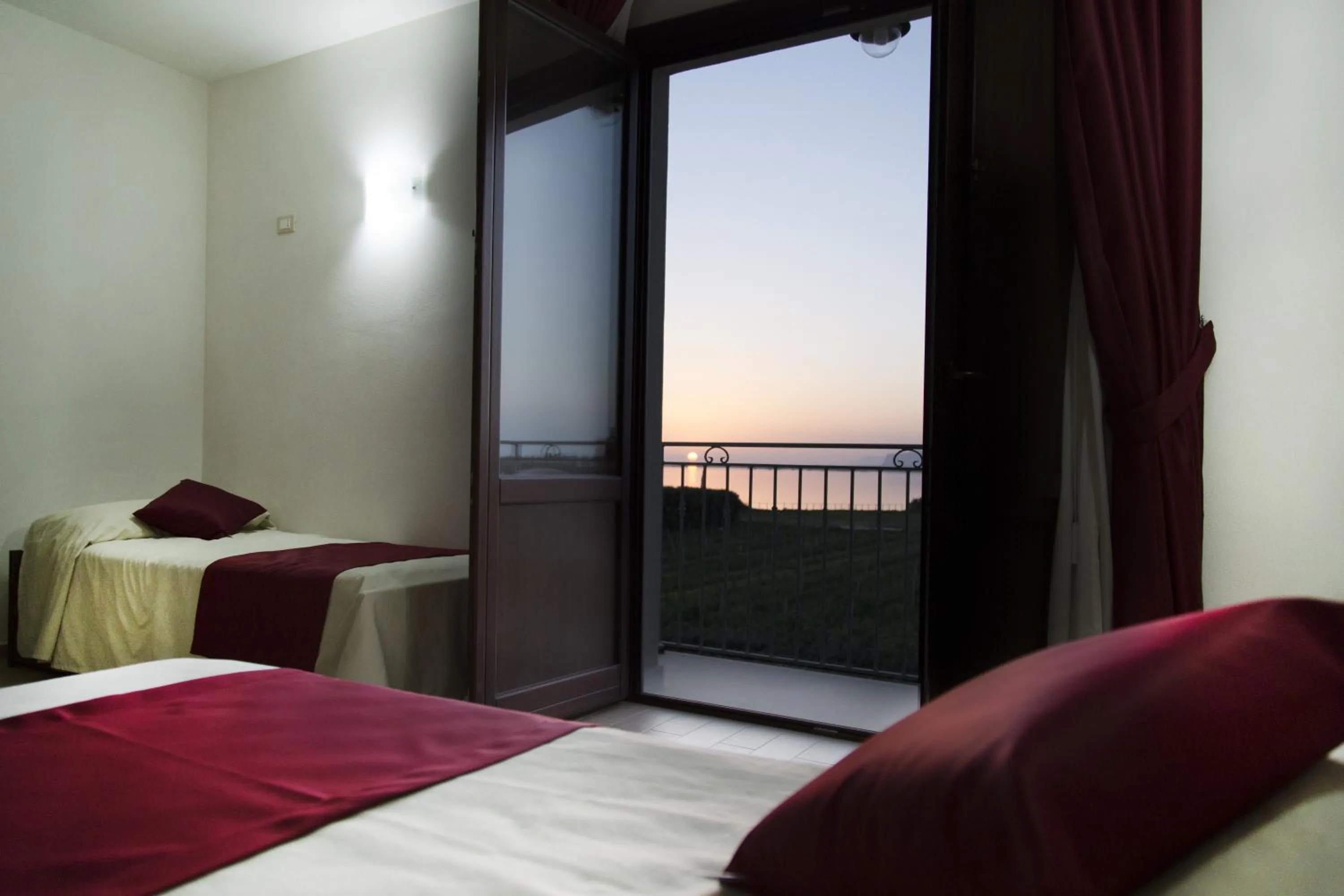 Bed in Resort Santa Maria Hotel