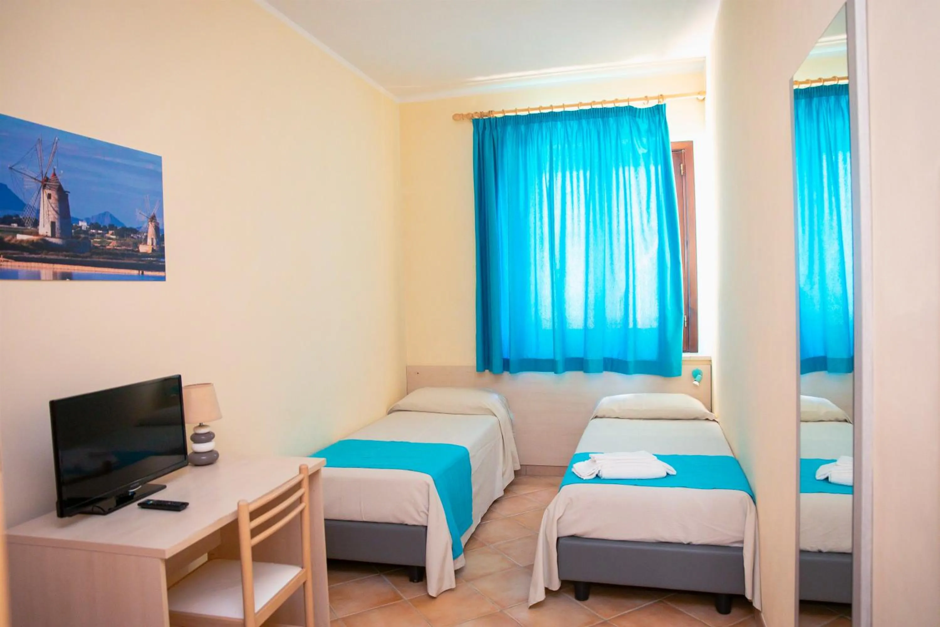 Bed in Resort Santa Maria Hotel