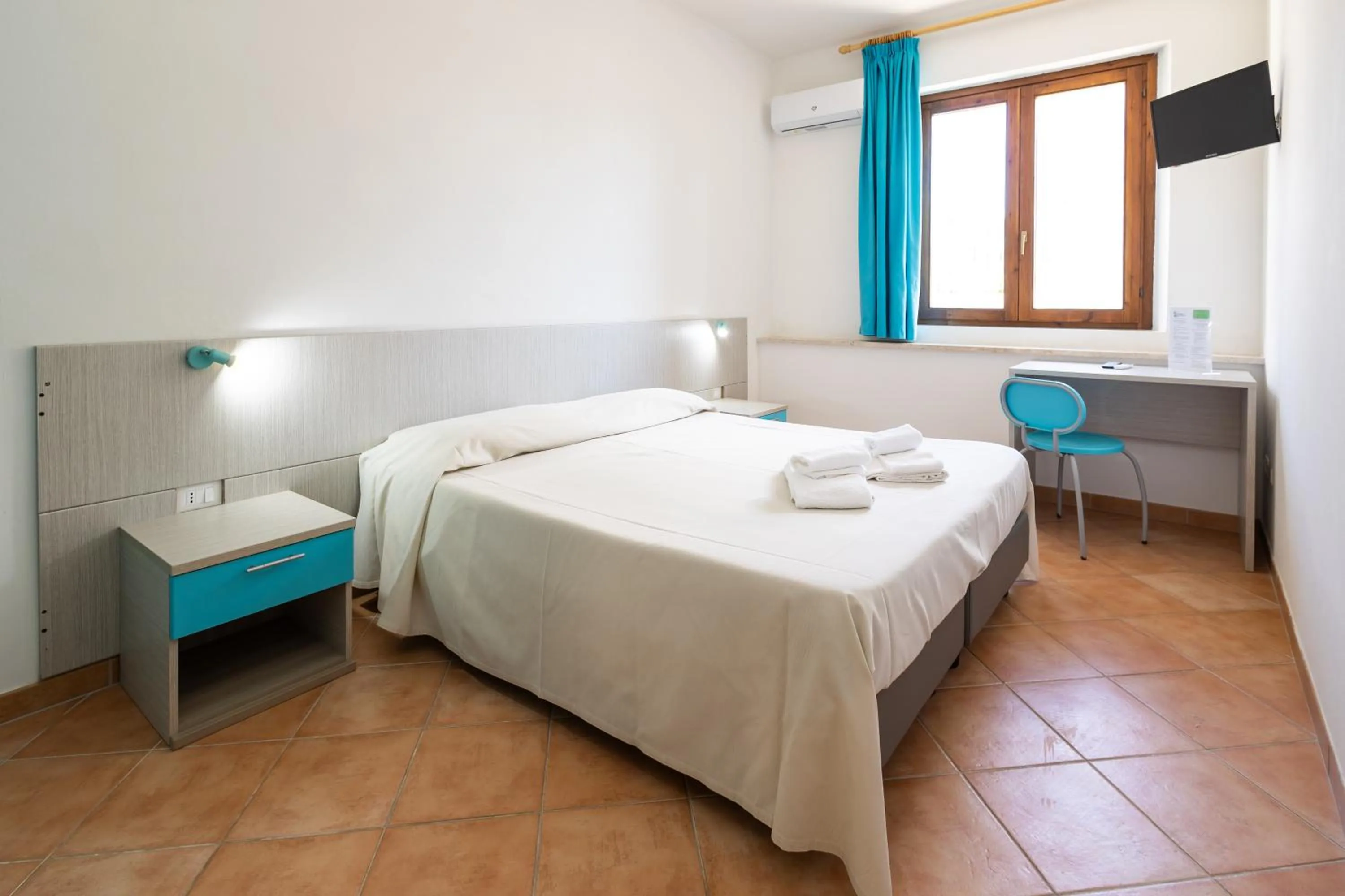 Bed in Resort Santa Maria Hotel