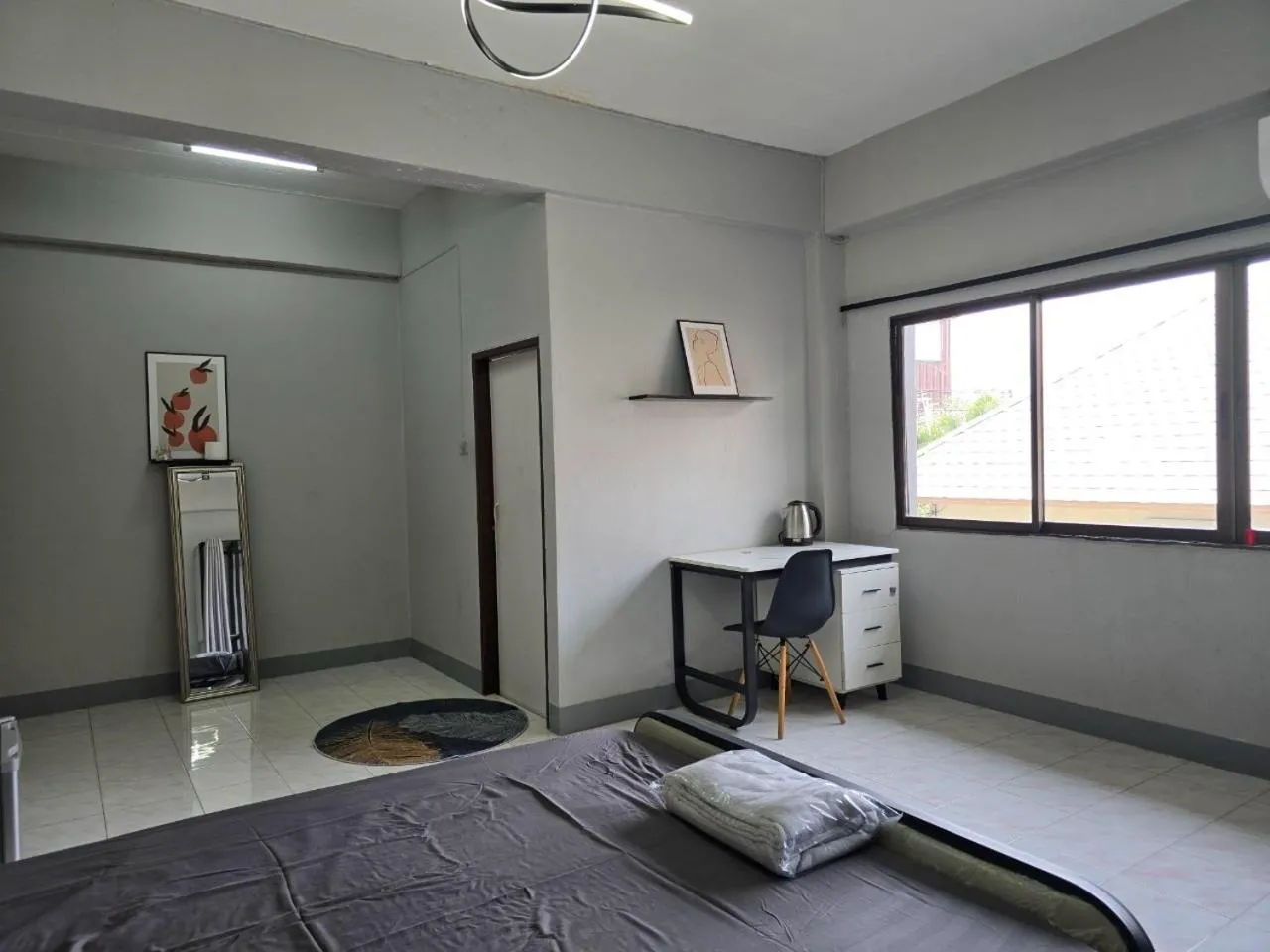 Bed in SRINN House, Bangkok