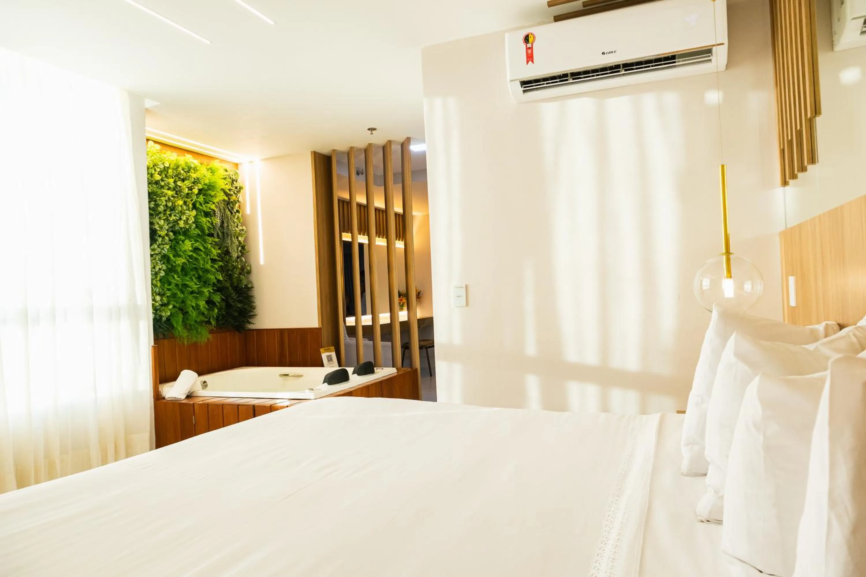 Bedroom, Bed in Ramada Hotel & Suites Campos Pelinca