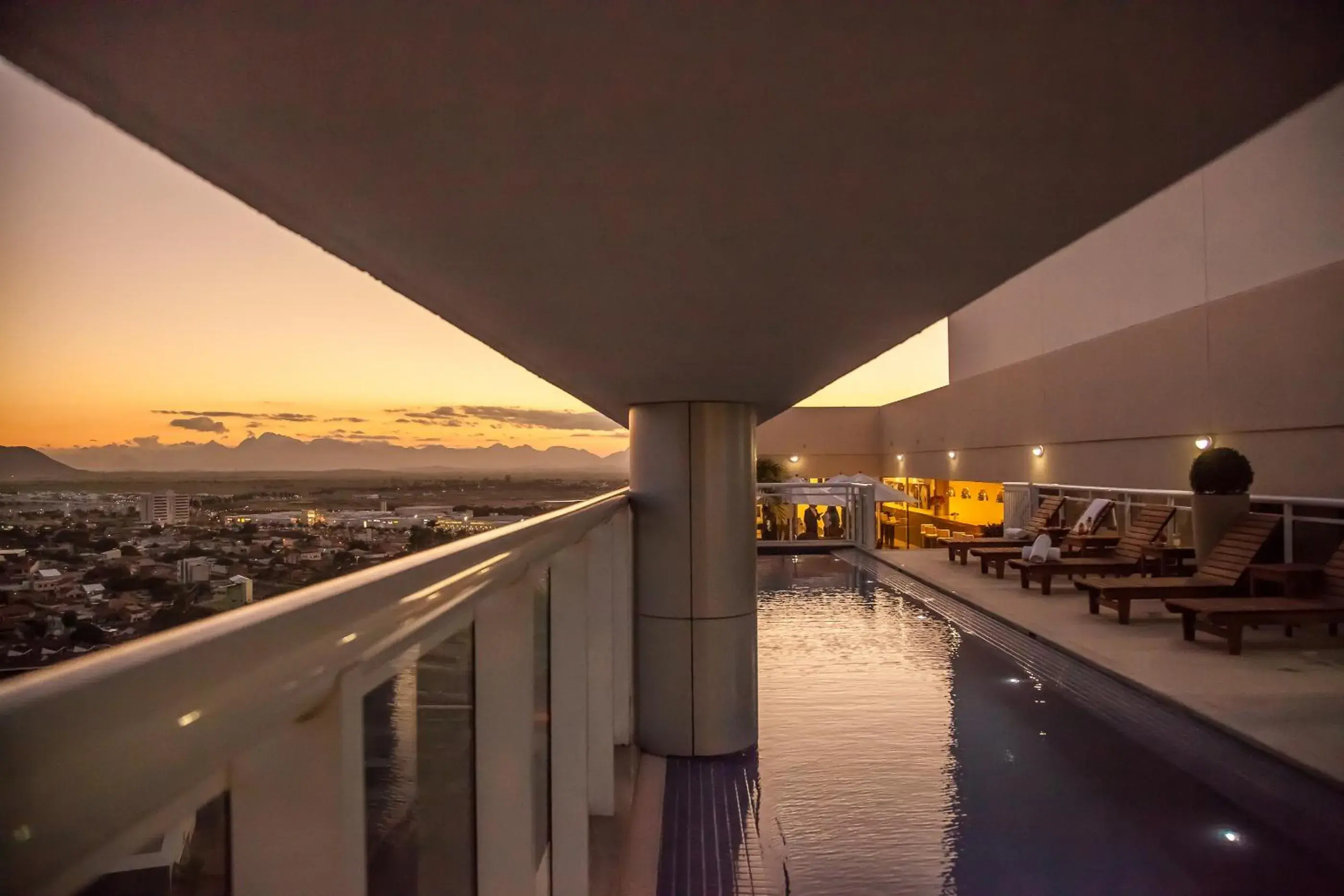 Swimming pool in Ramada Hotel & Suites Campos Pelinca Swimming pool in Ramada Hotel & Suites Campos Pelinca