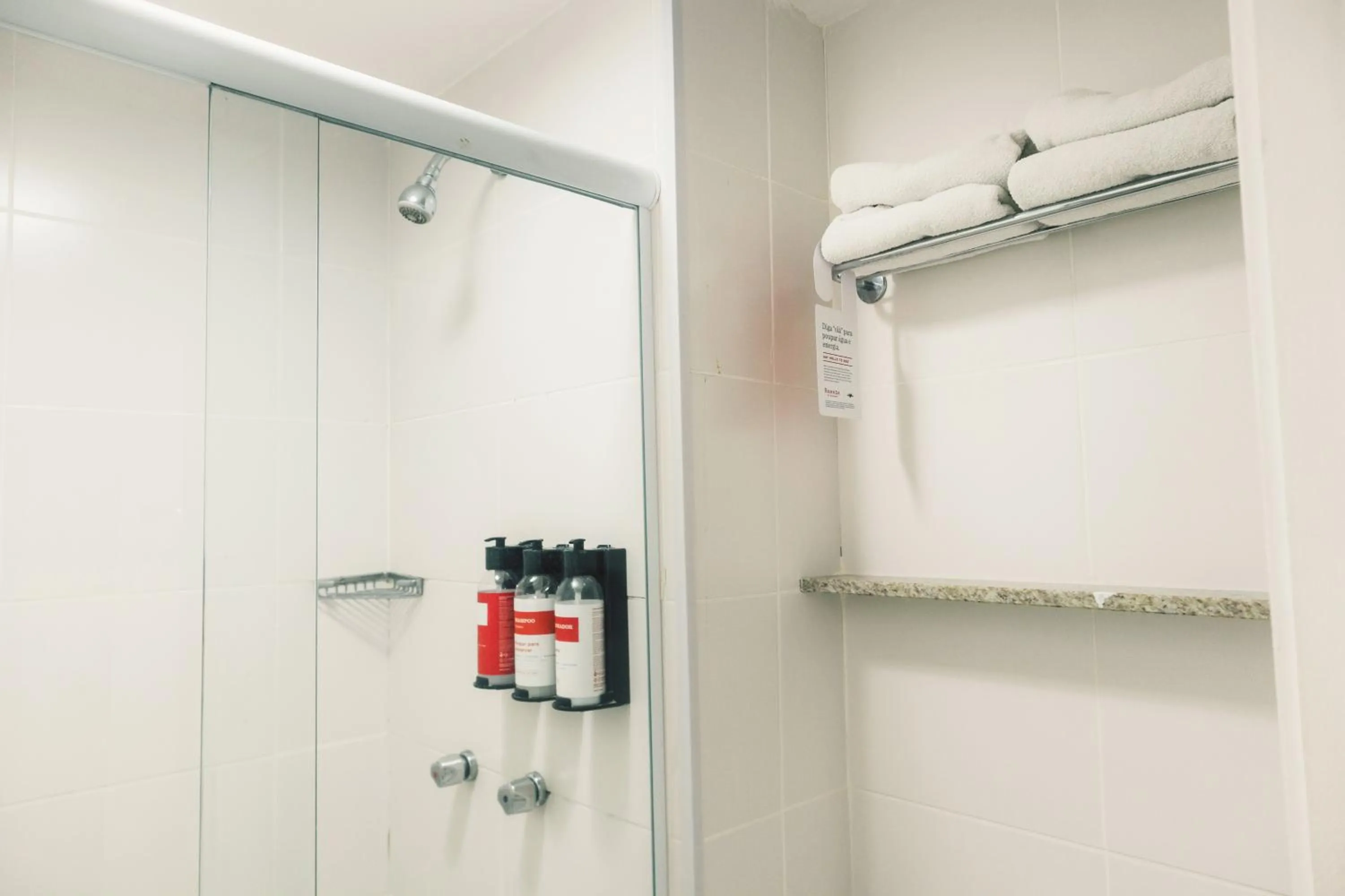 Bathroom in Ramada Hotel & Suites Campos Pelinca