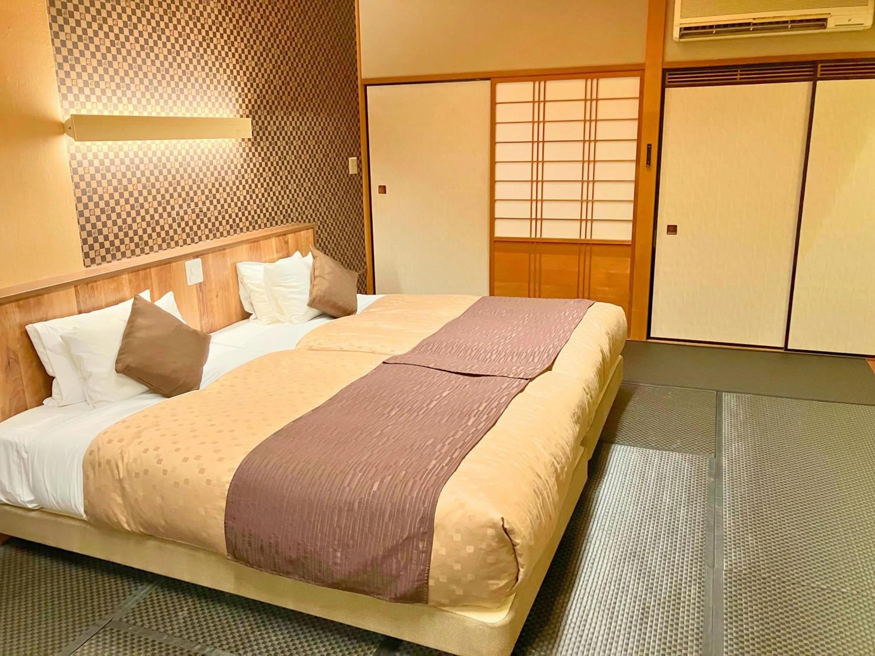 Bed in LiVEMAX RESORT Shizuoka Amagiyugashima