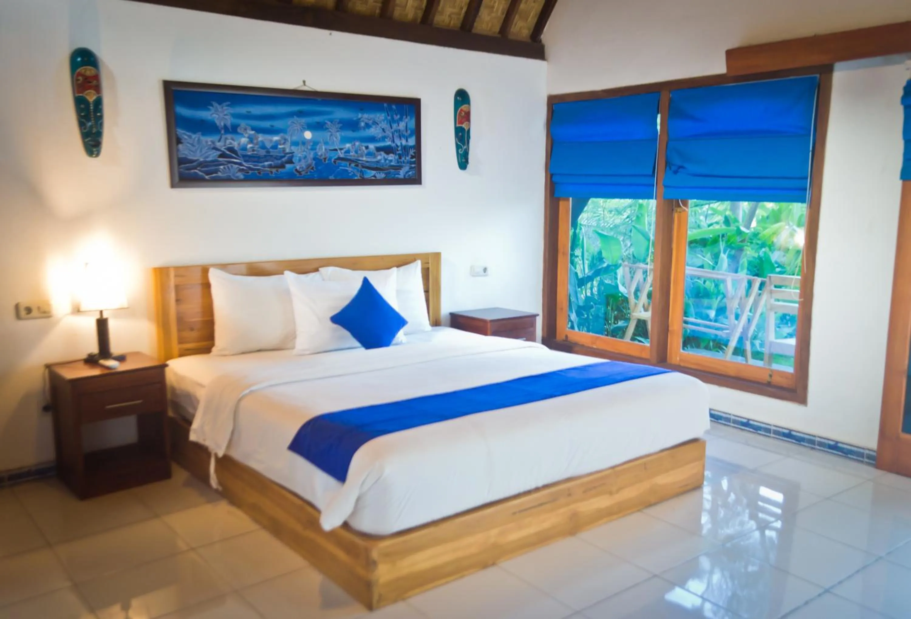 Bed in Blue Monkey Retreat Areguling Lombok