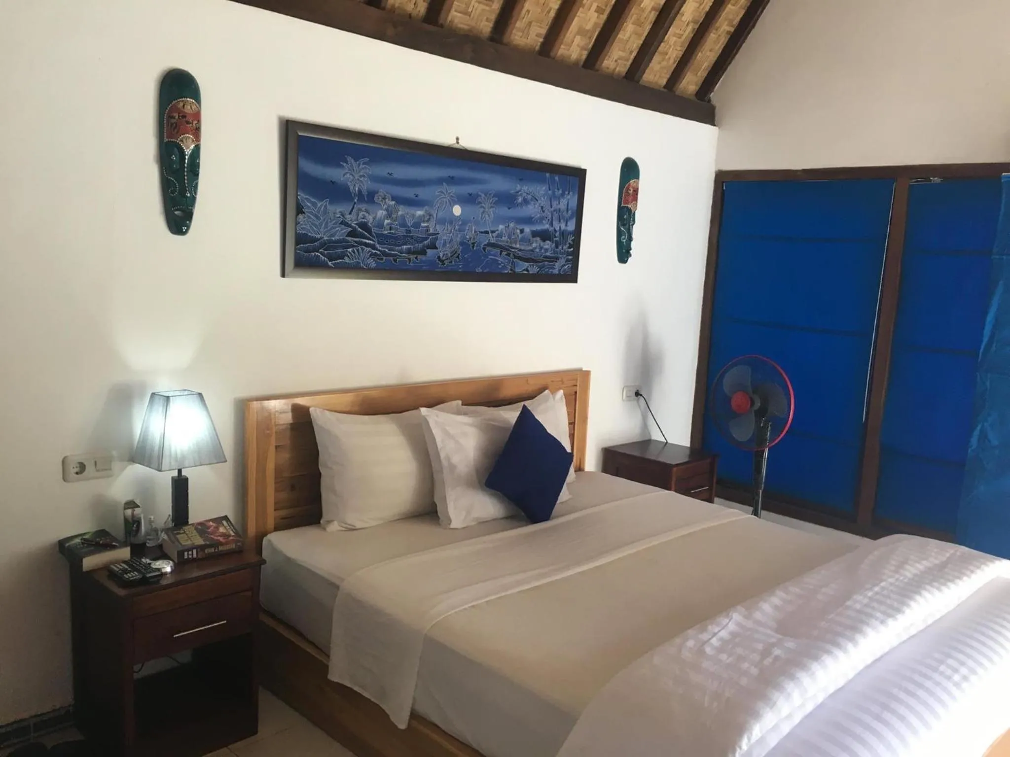 Bed in Blue Monkey Retreat Areguling Lombok