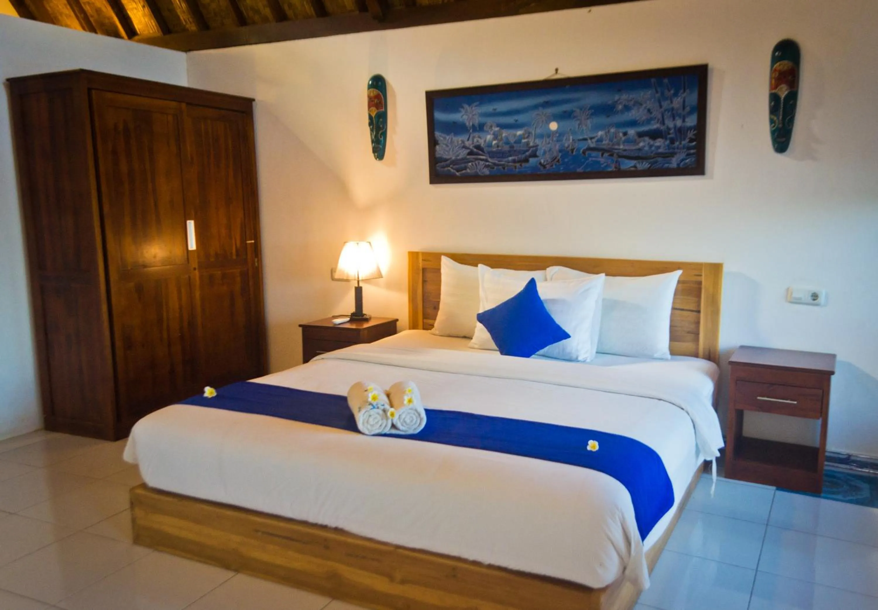 Bed in Blue Monkey Retreat Areguling Lombok