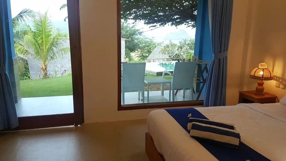 Bed in Blue Monkey Retreat Areguling Lombok