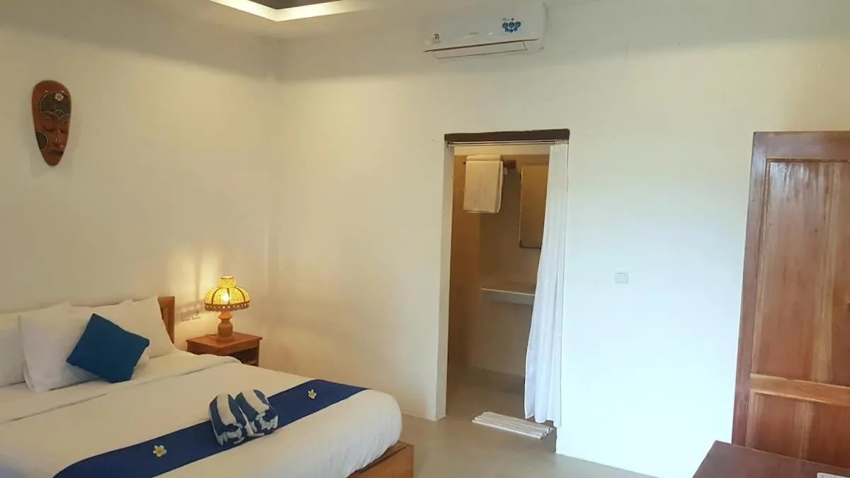 Bed in Blue Monkey Retreat Areguling Lombok