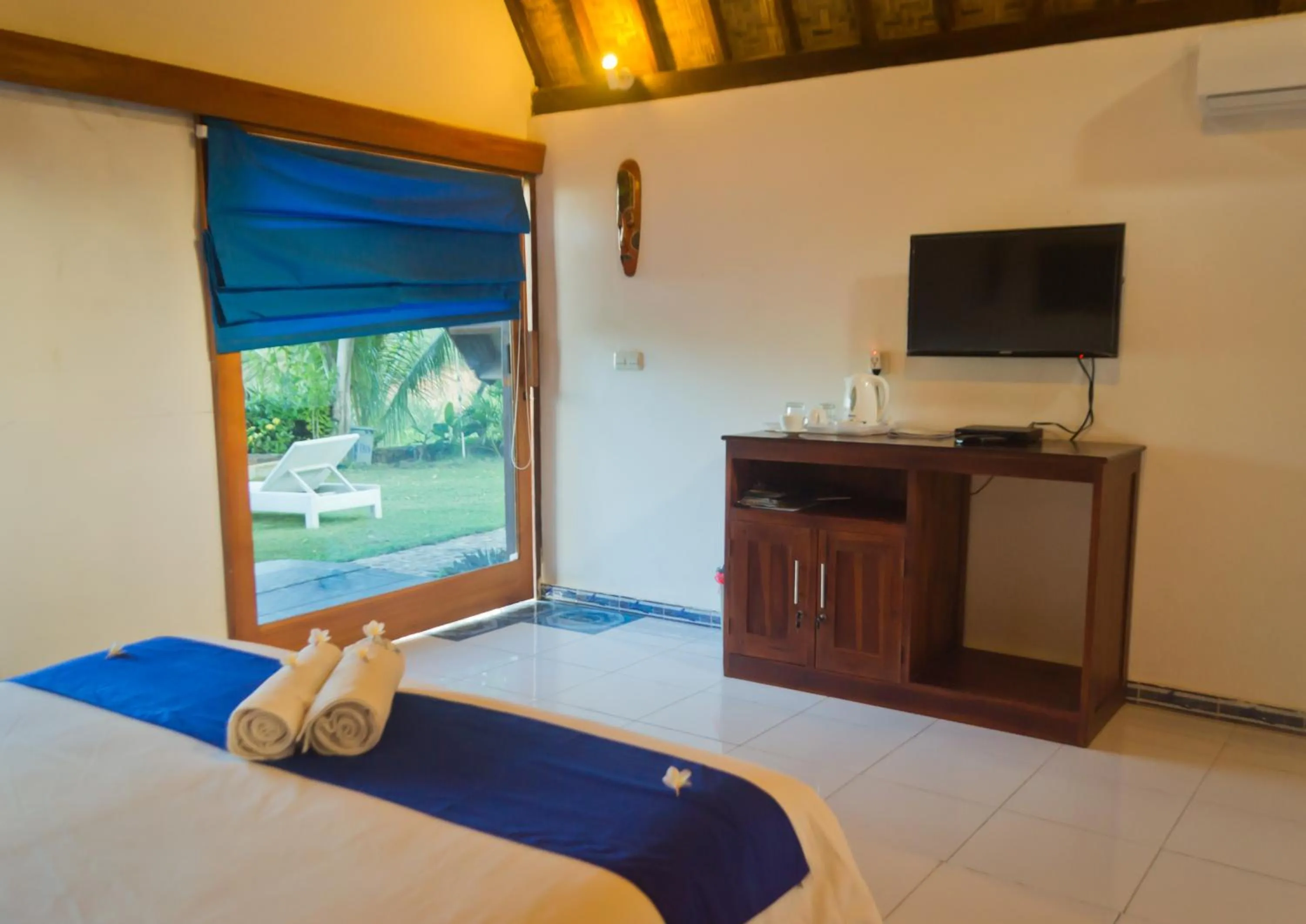 Bed in Blue Monkey Retreat Areguling Lombok