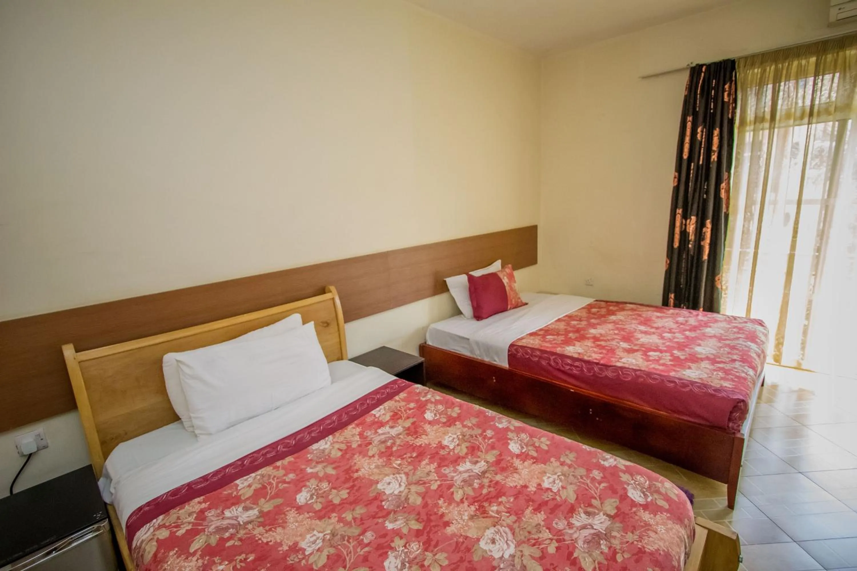 Bed in Grand Global Hotel