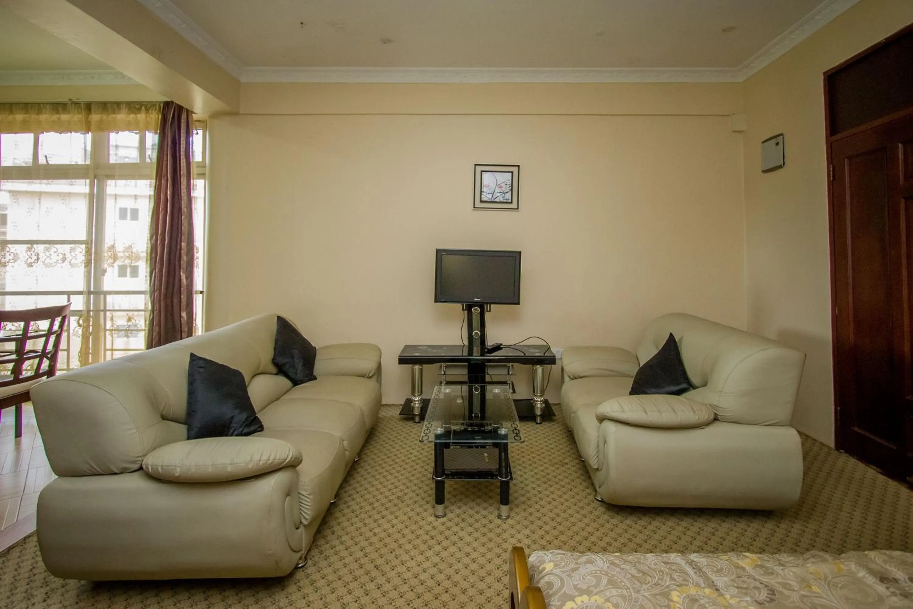 Living room in Grand Global Hotel