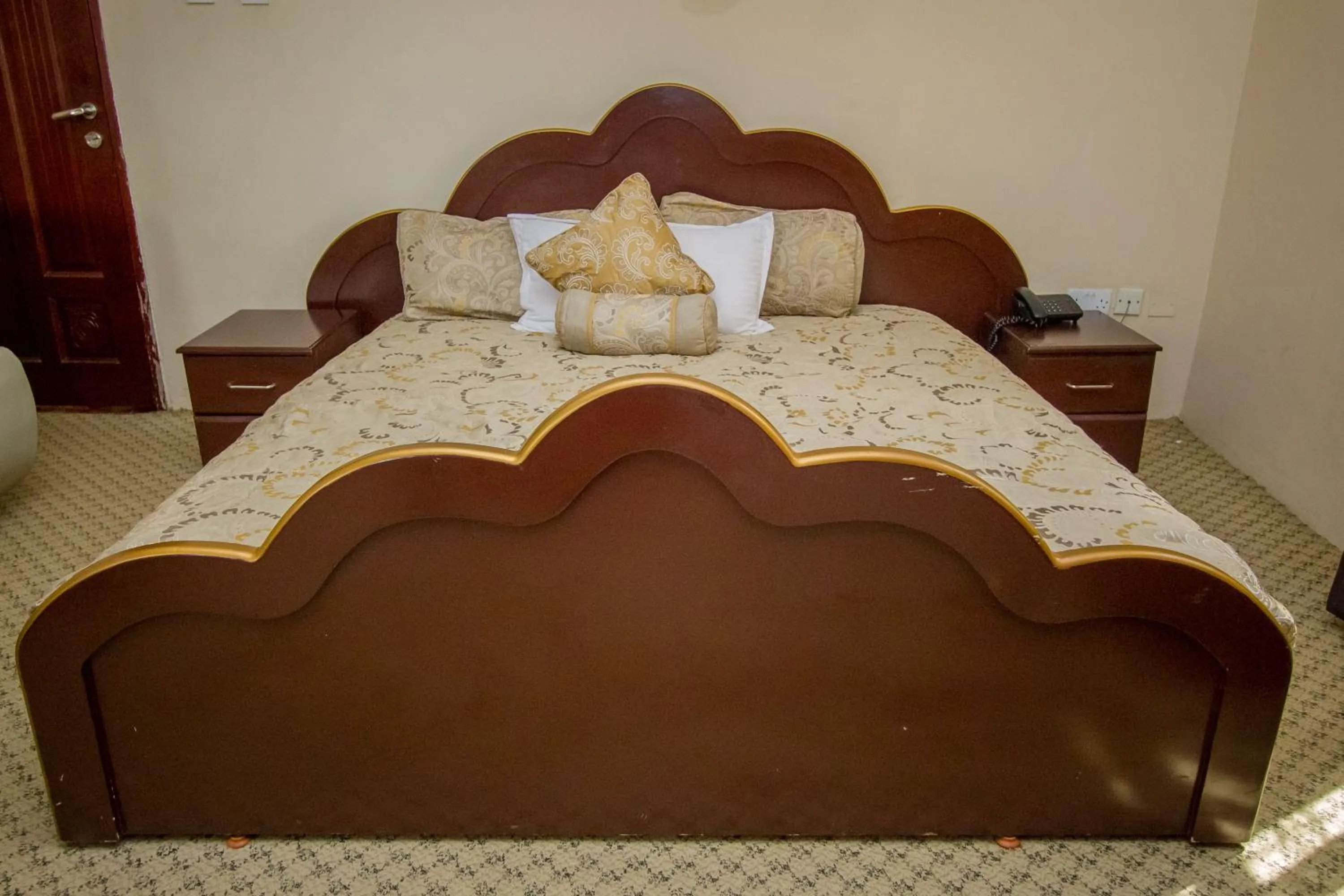 Bed in Grand Global Hotel