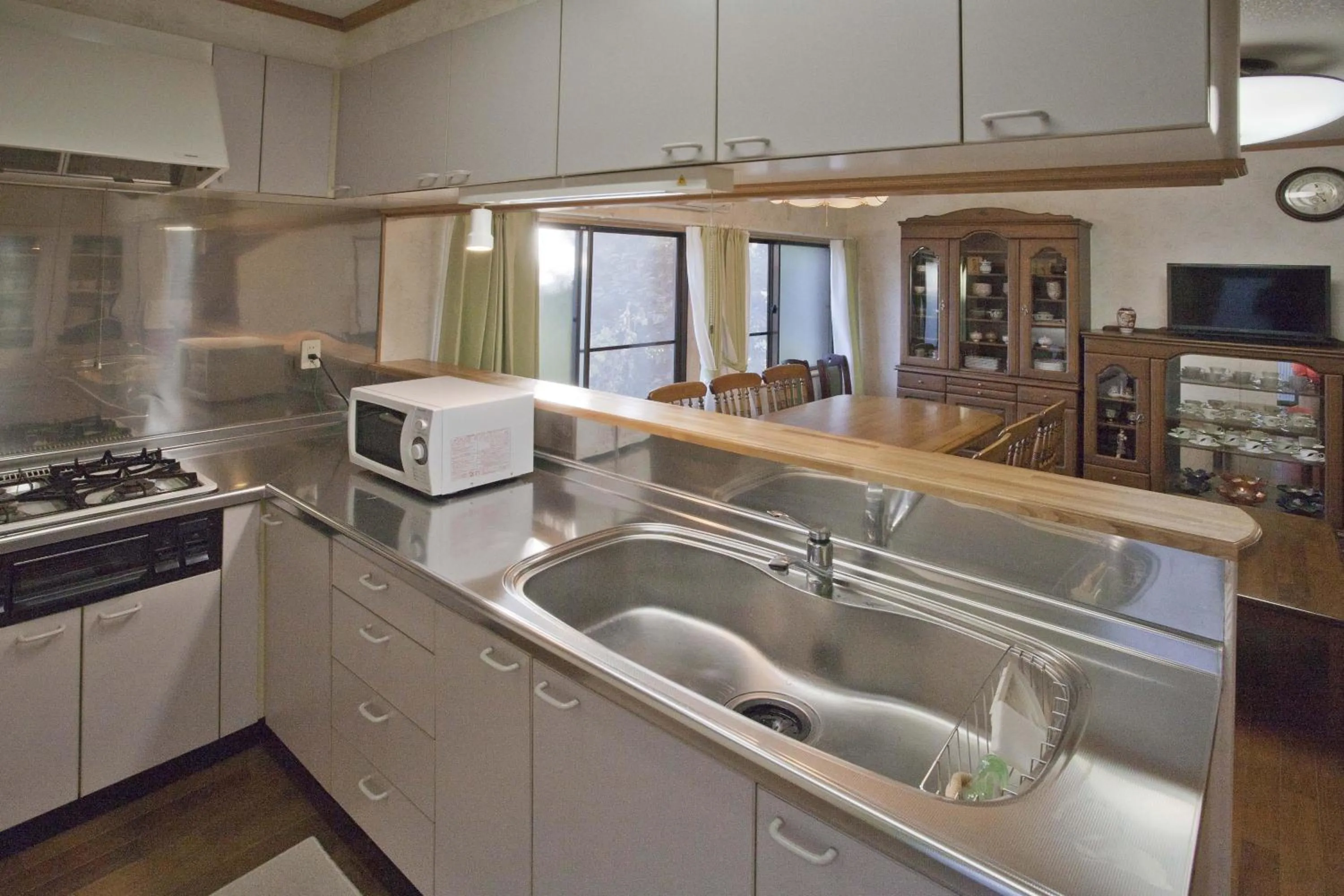 Kitchen or kitchenette in Dormitory Sandanya Guesthouse