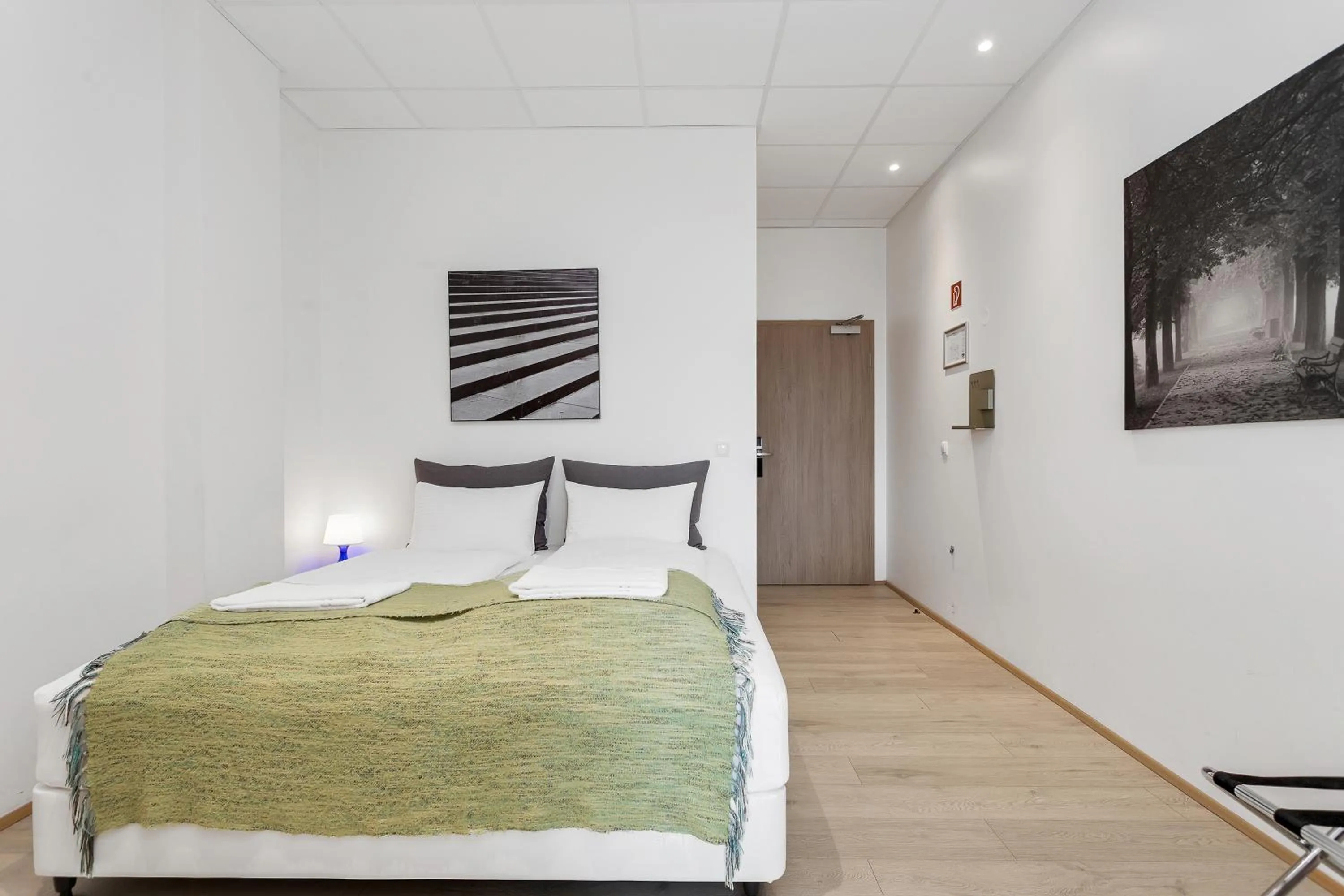 Bed in Blue Mountain Apartments by Heimaleiga