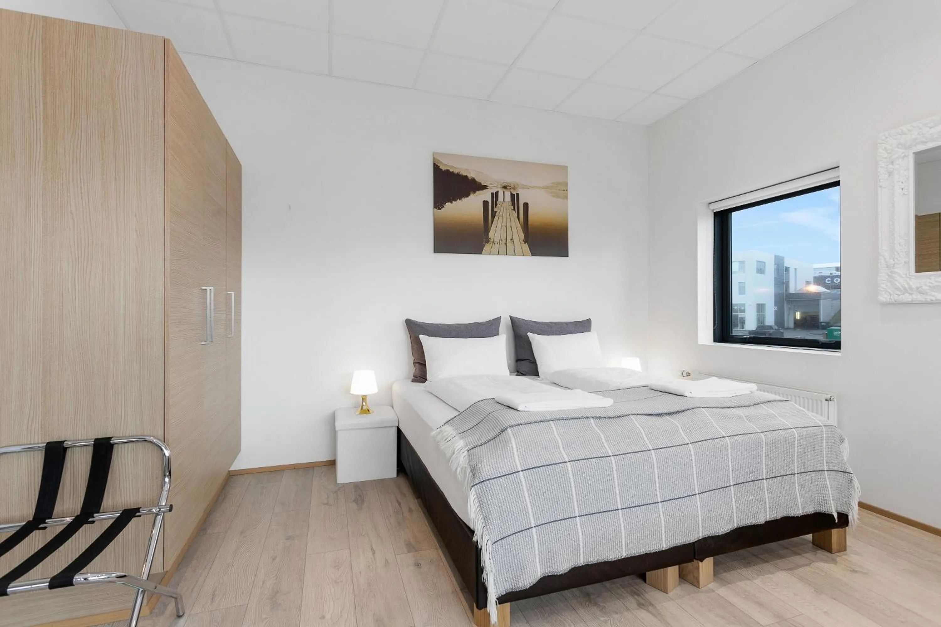 Bed in Blue Mountain Apartments by Heimaleiga