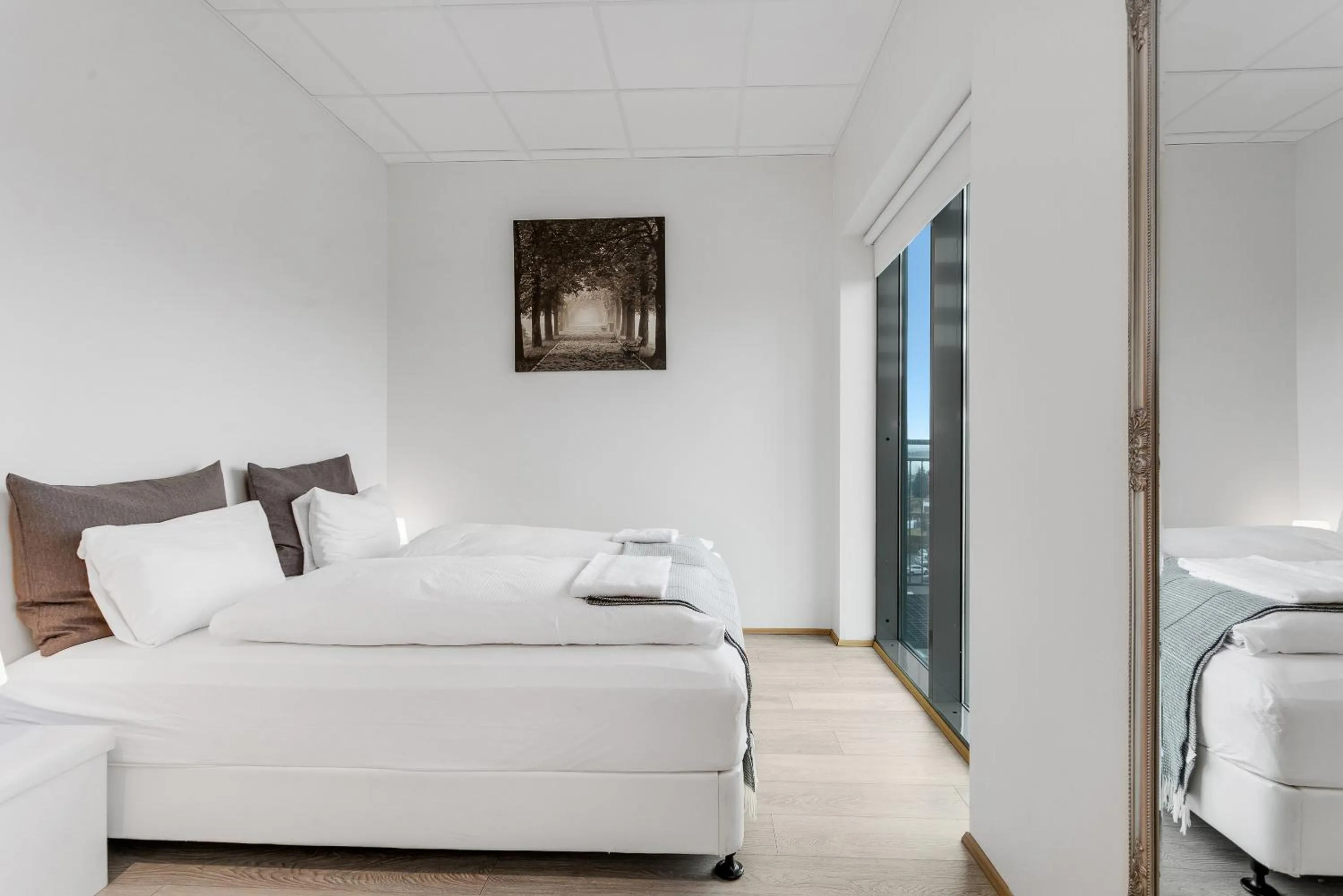 Bed in Blue Mountain Apartments by Heimaleiga