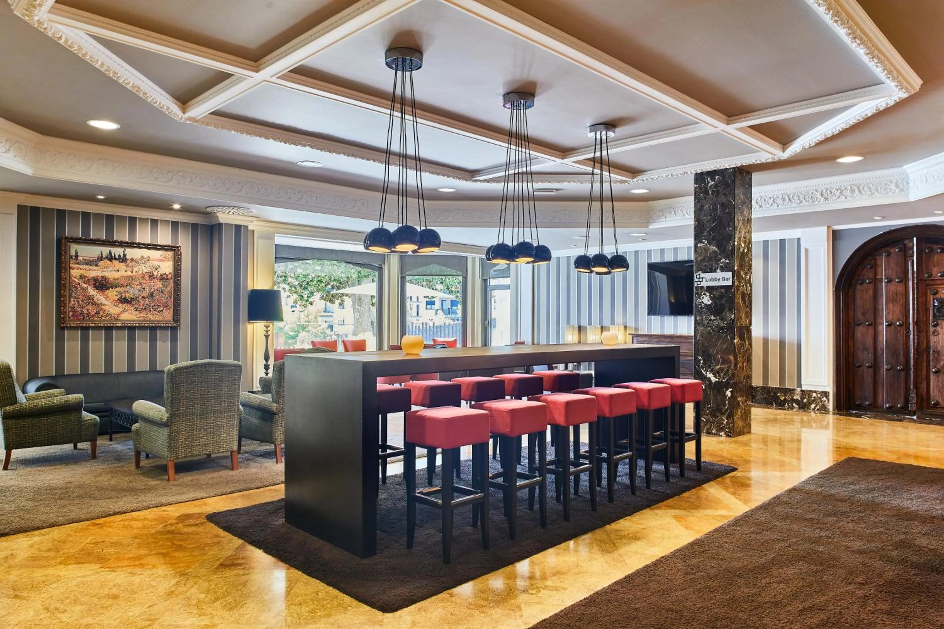 Communal lounge/ TV room in Silken Gran hotel Durango