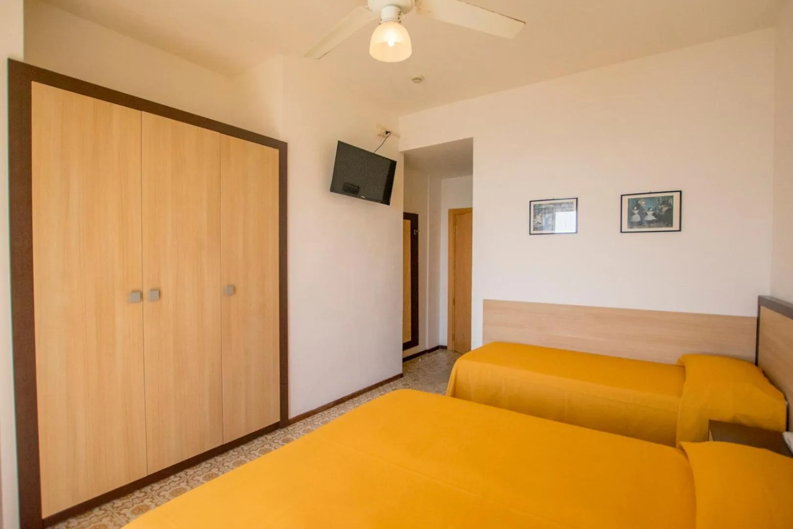 Communal lounge/ TV room, Bed in Hotel Apollonia