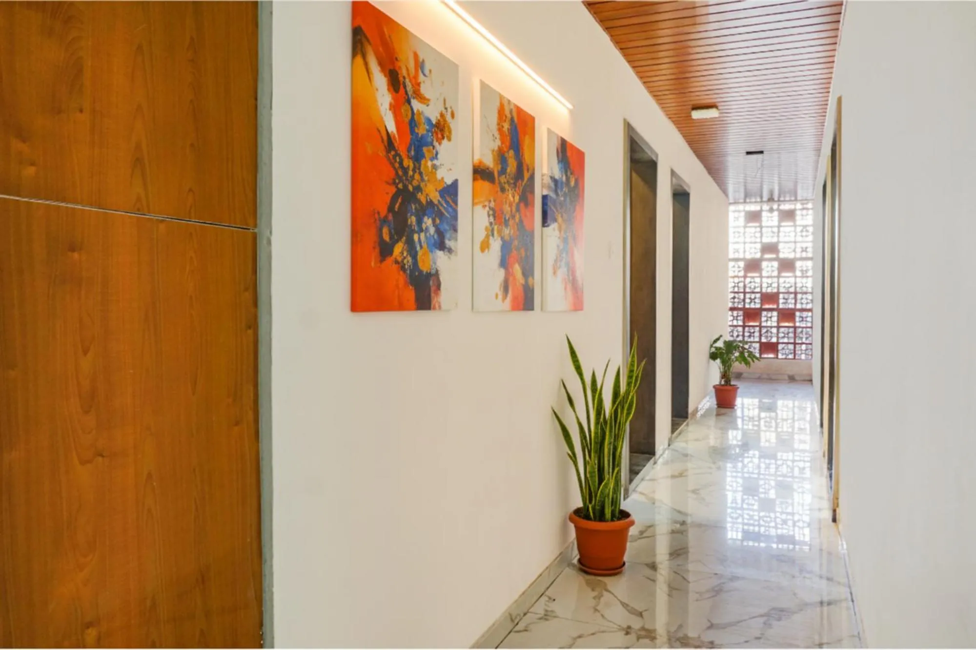 FabHotel Rising Surya - Nr Embassy Tech Zone