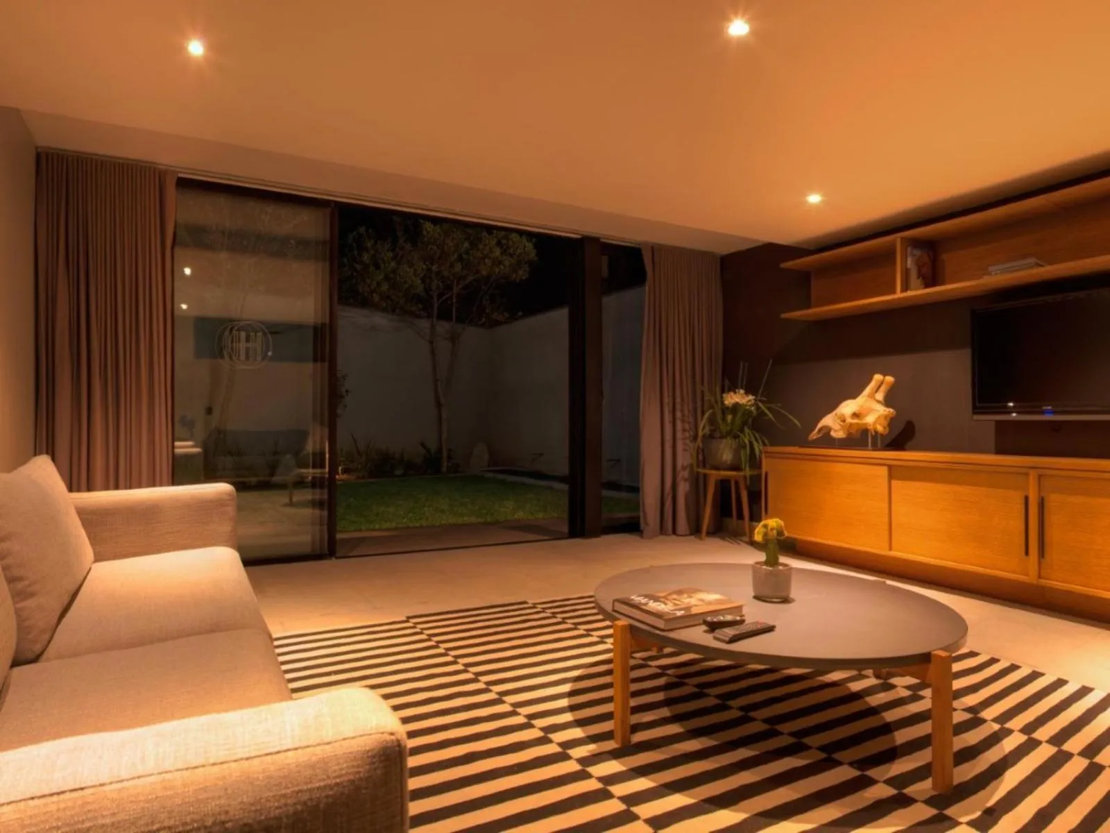 Communal lounge/ TV room in The Hamilton Boutique Hotel