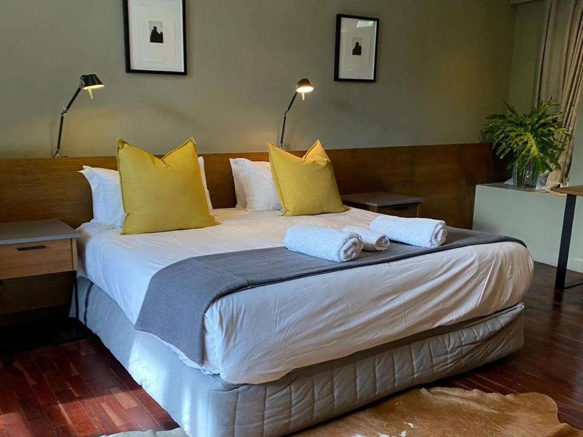 Bed in The Hamilton Boutique Hotel