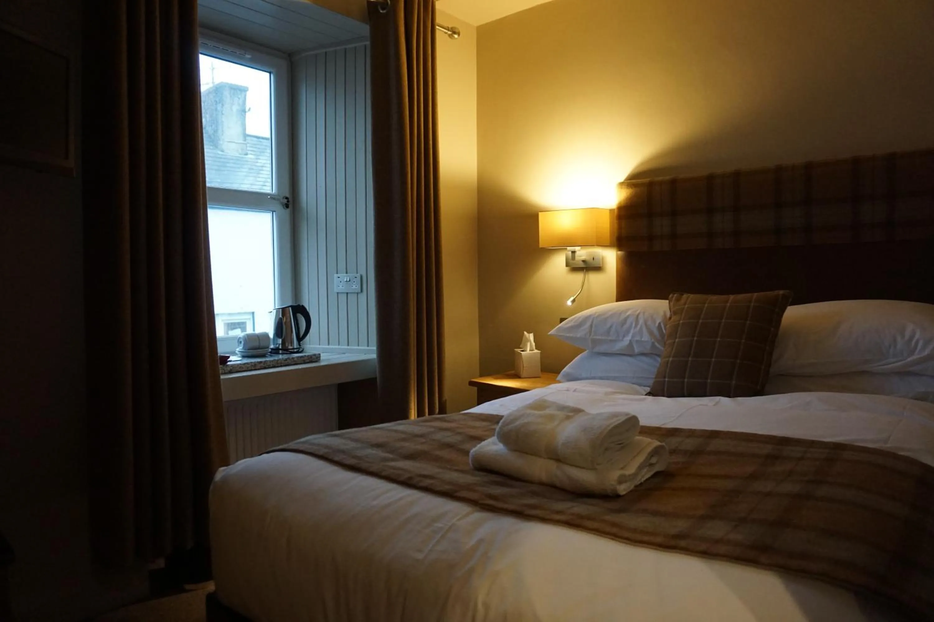 Bed in Lochside Hotel