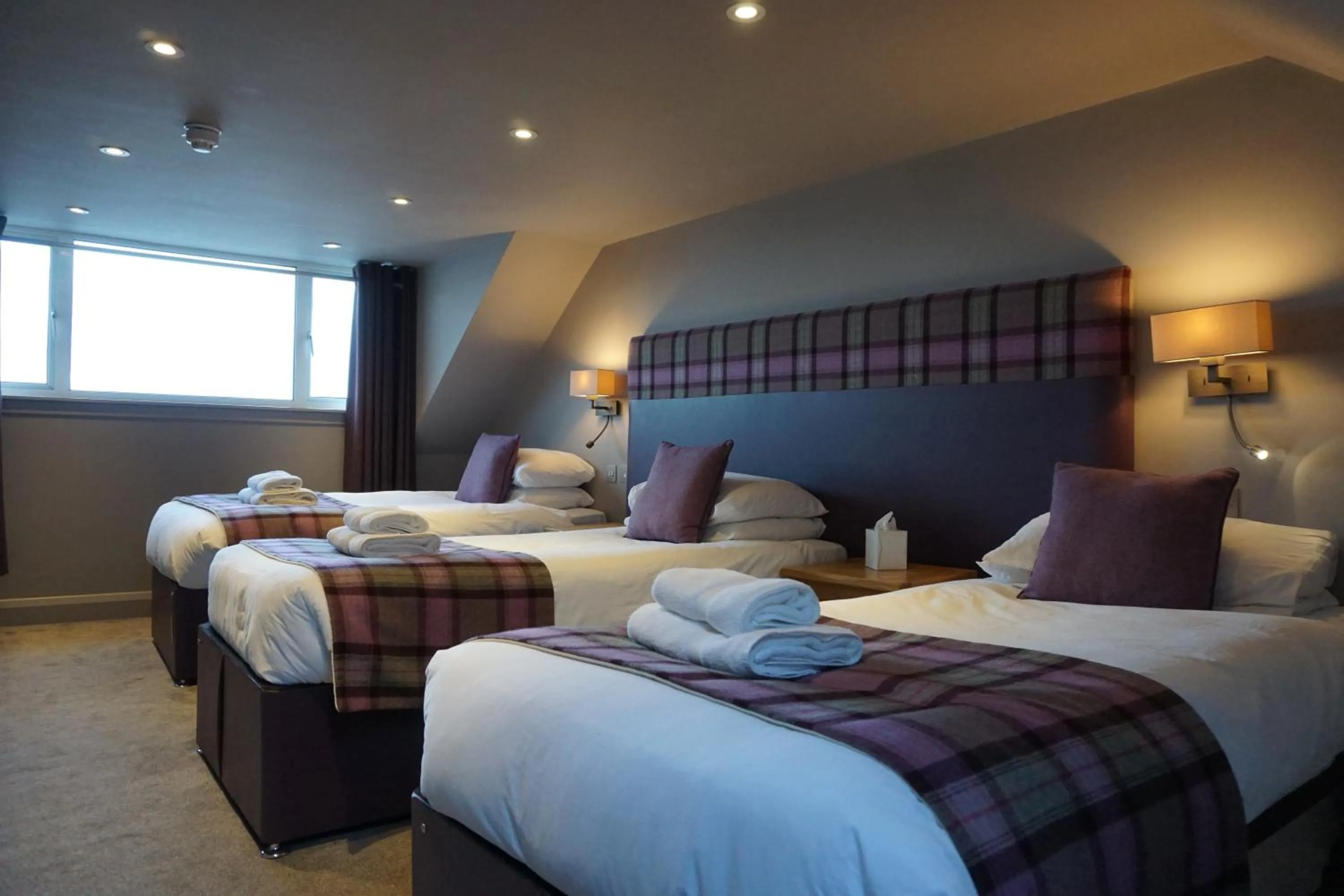 Bed in Lochside Hotel