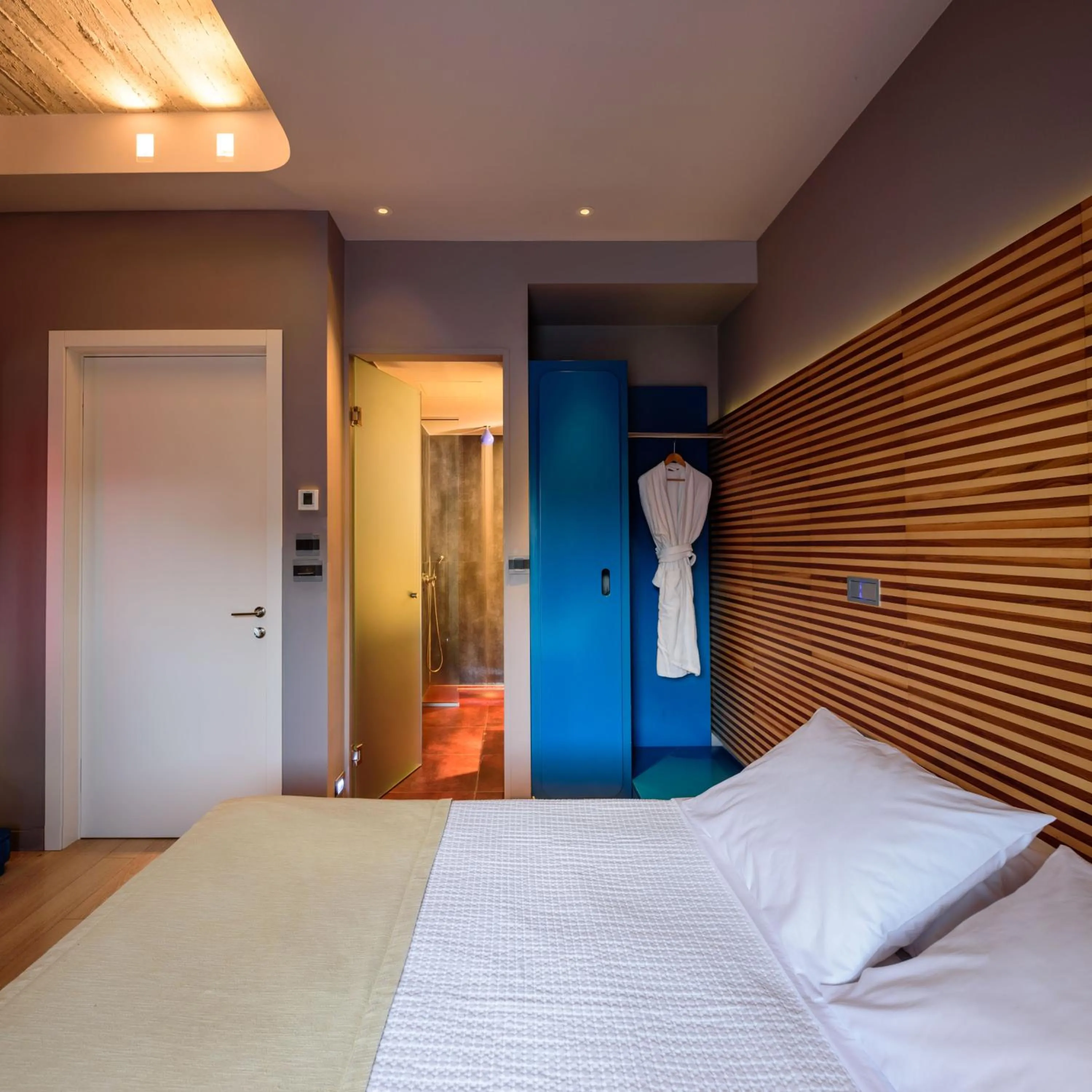 Bed in Essence Hotel