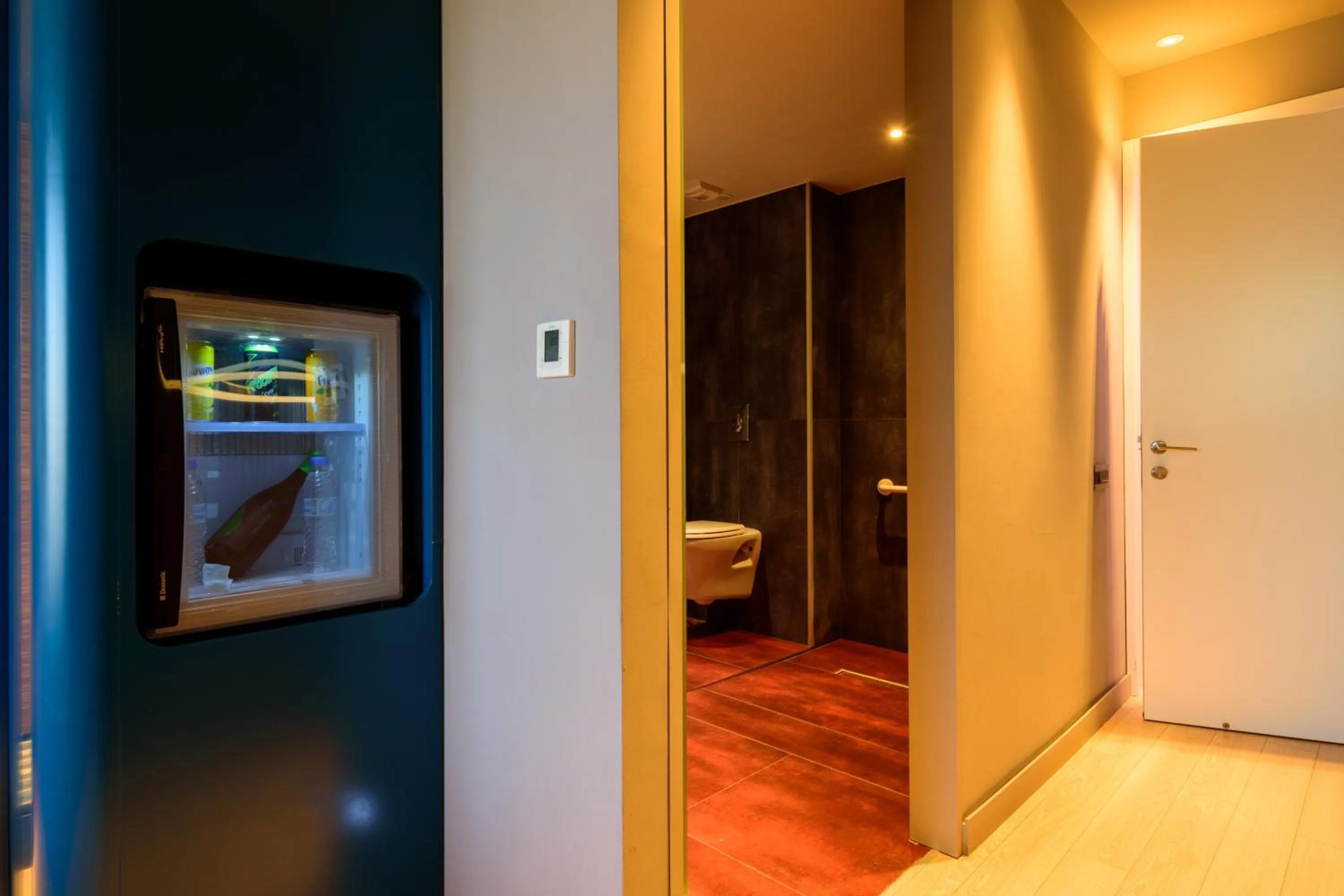 Toilet in Essence Hotel