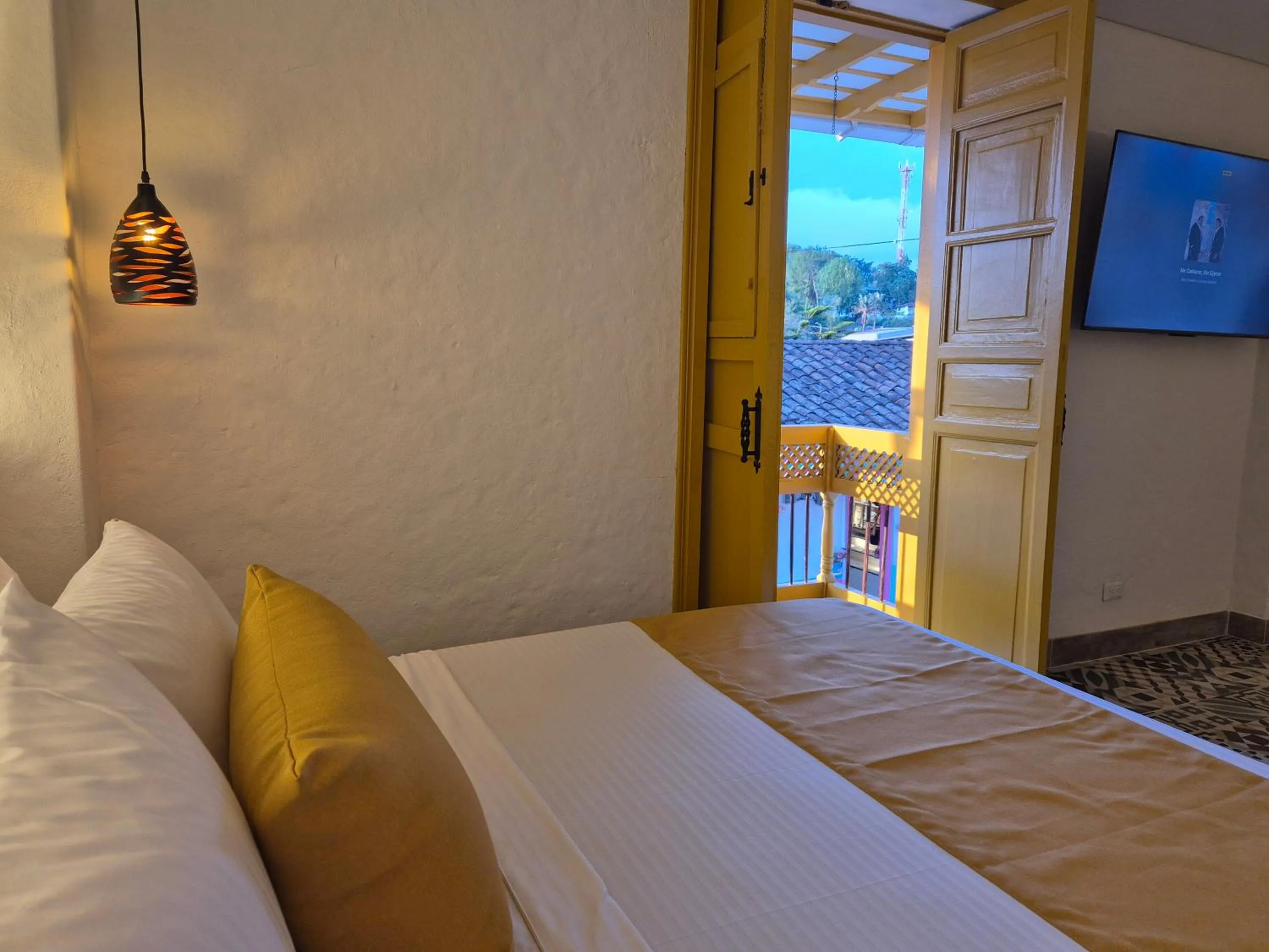 Bed in Casa Serafin Hotel