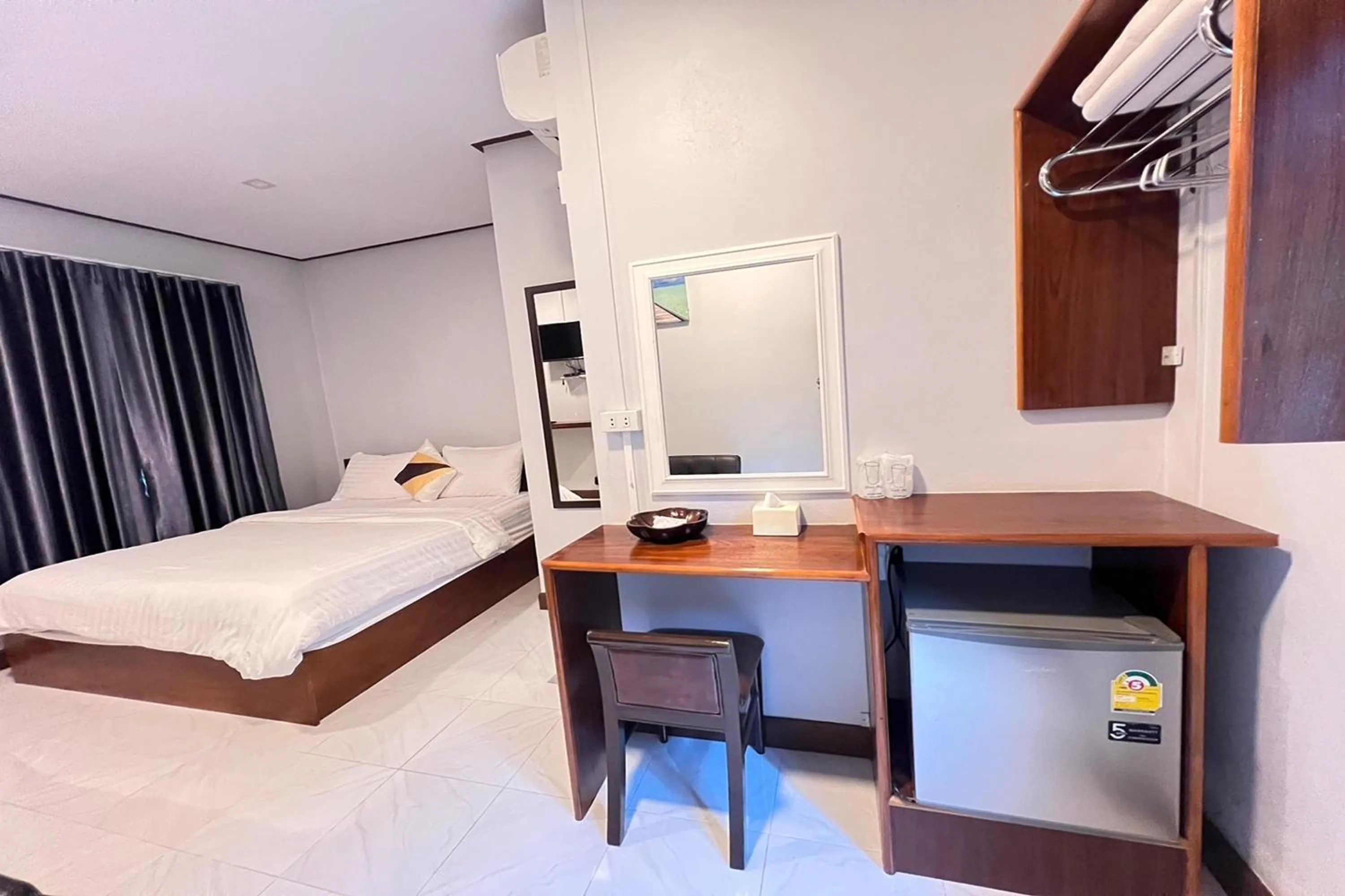 Bed in Lan Bua Resort