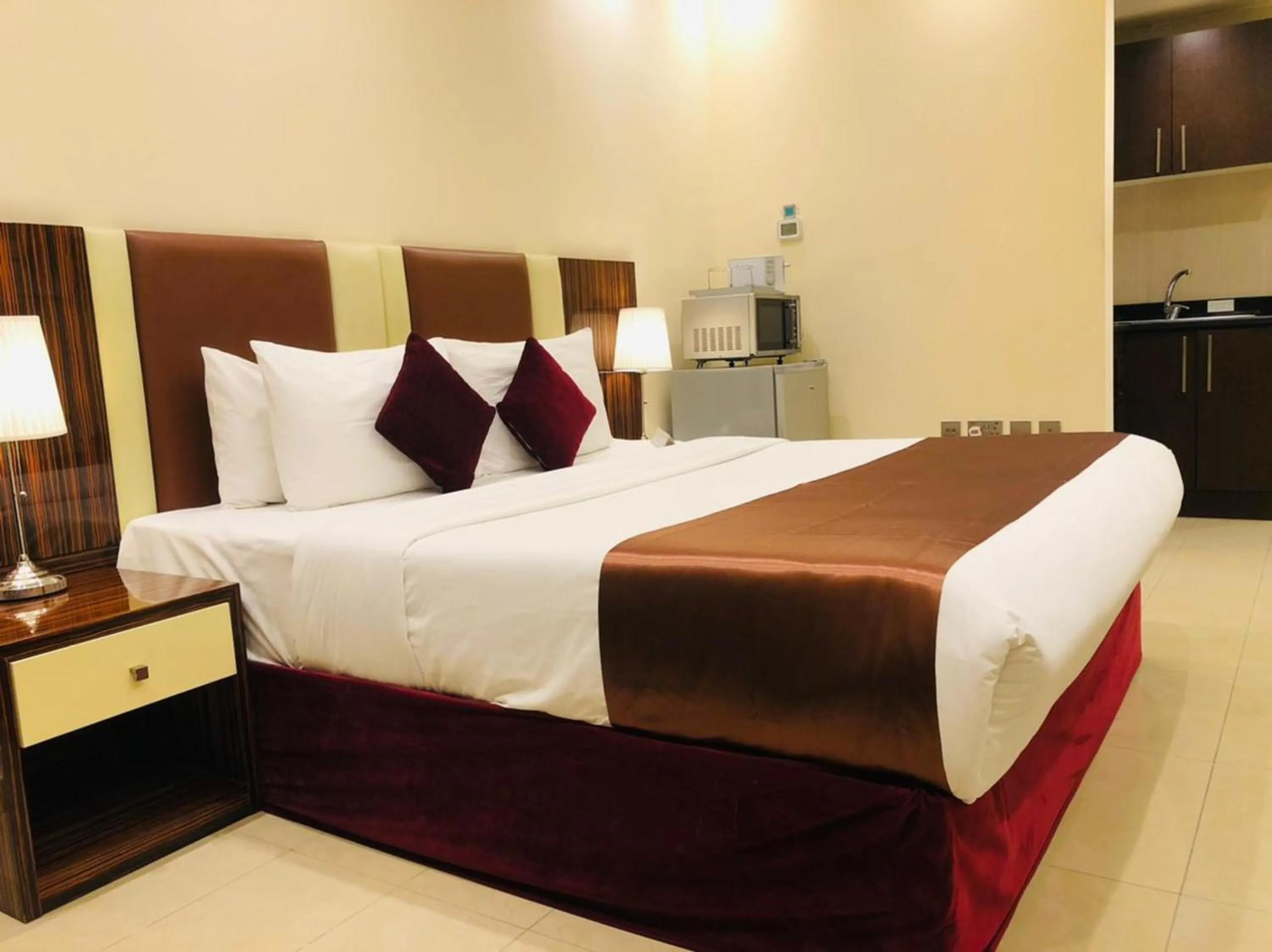 Bed in The View Al Barsha Hotel Apartments