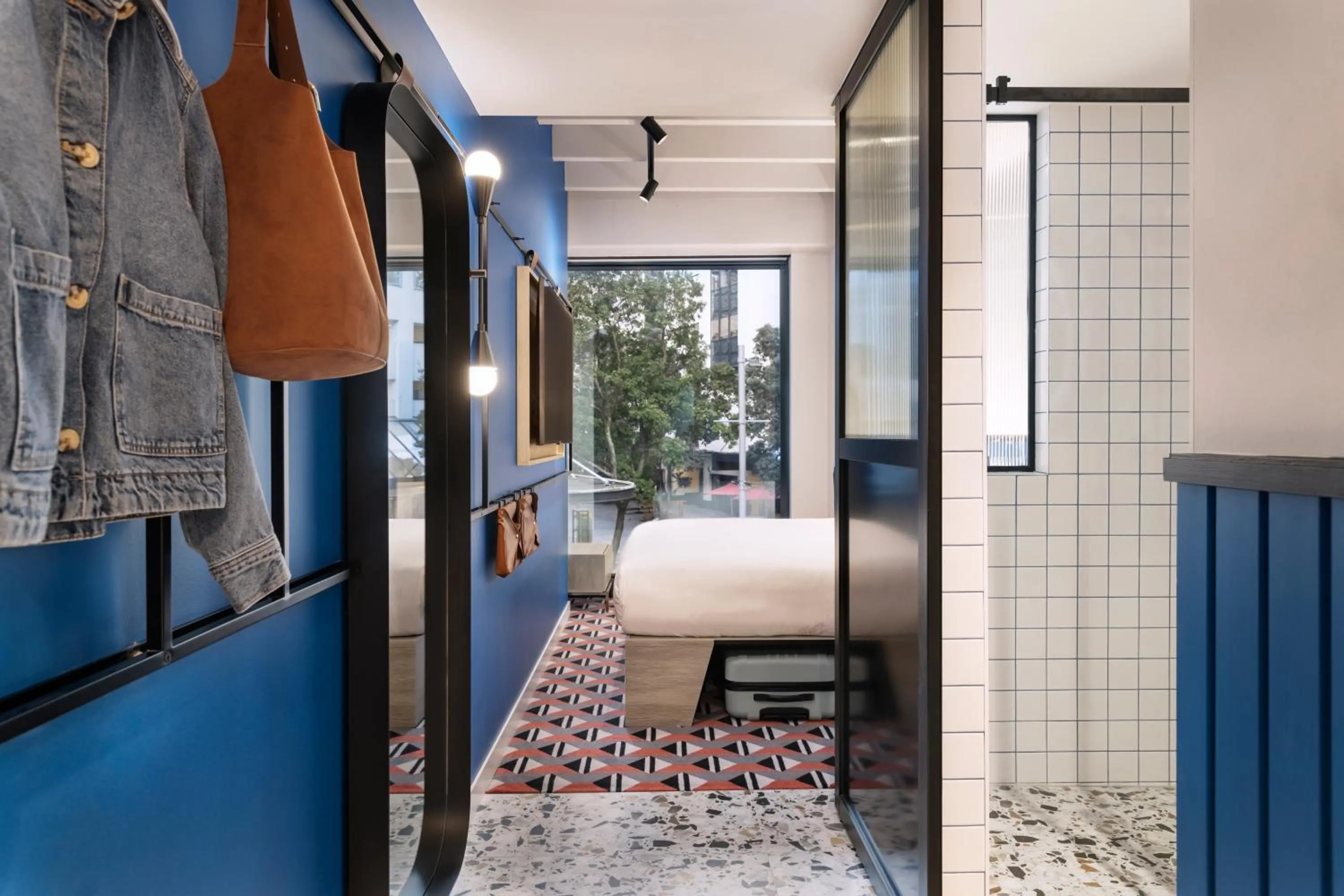 Photo of the whole room, Bed in TRIBE Auckland