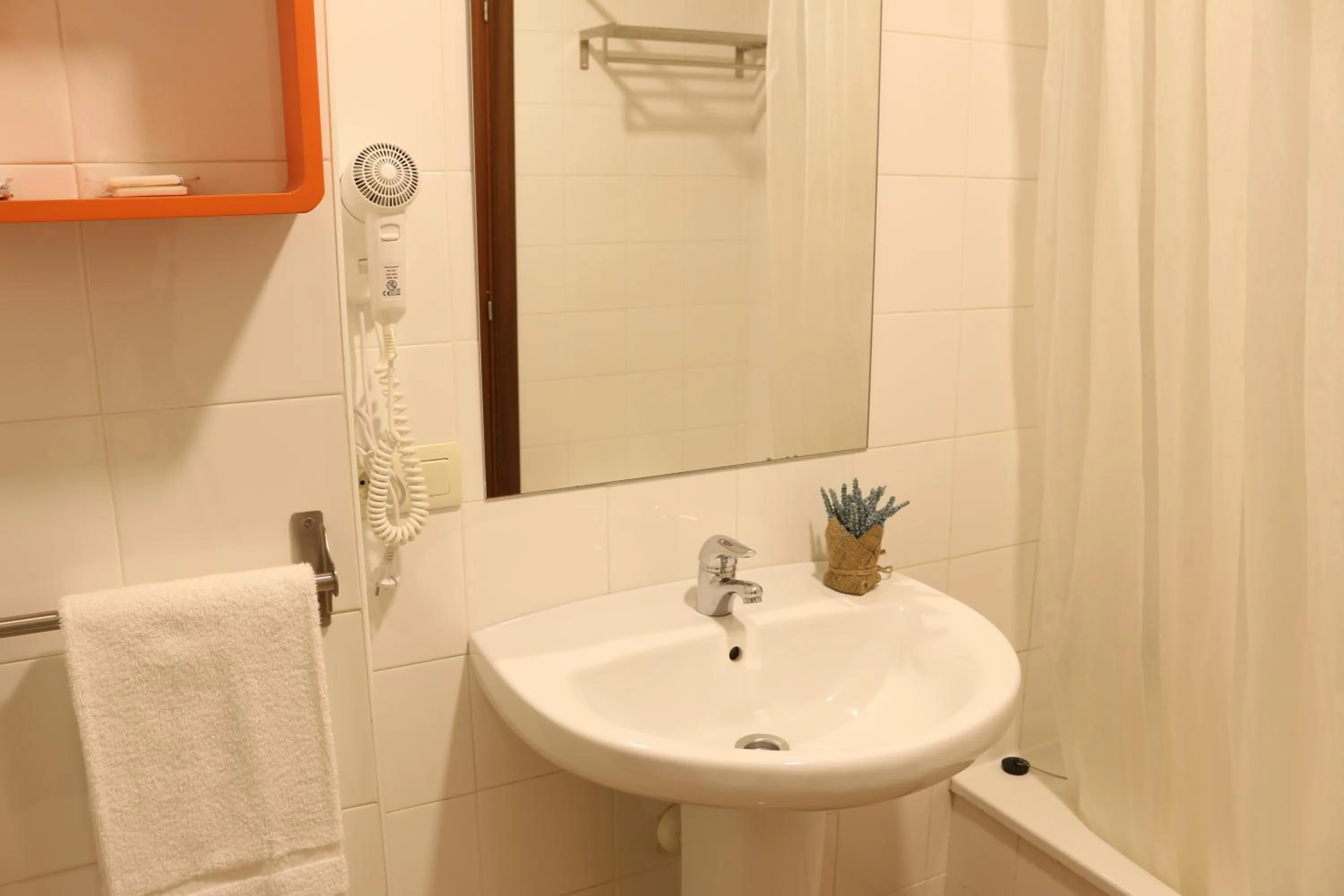 Bathroom in Apartamentos Turísticos Cancelas by Bossh Hotels