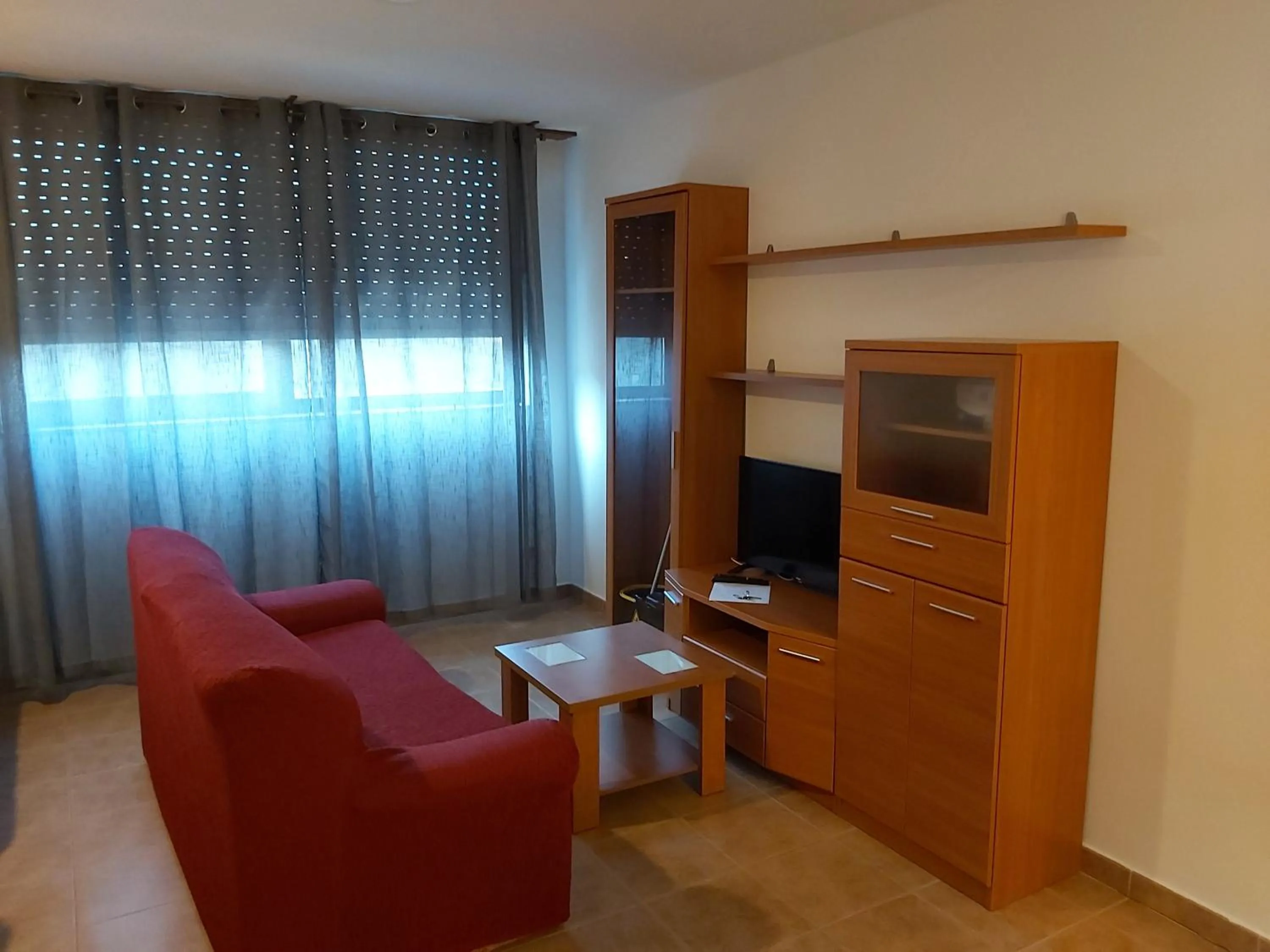 Seating area in Apartamentos Turísticos Cancelas by Bossh Hotels