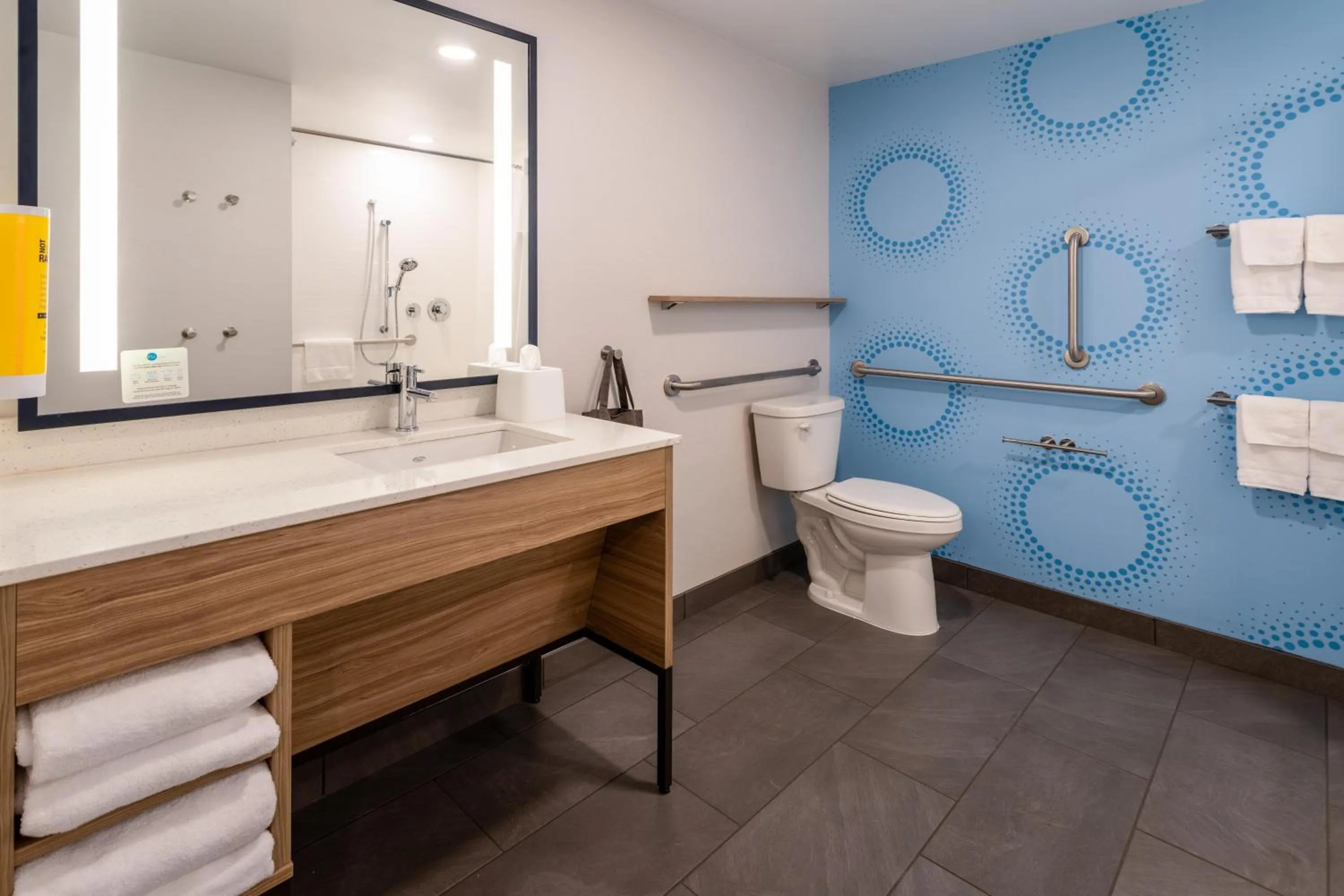 Bathroom in Tru By Hilton Commerce